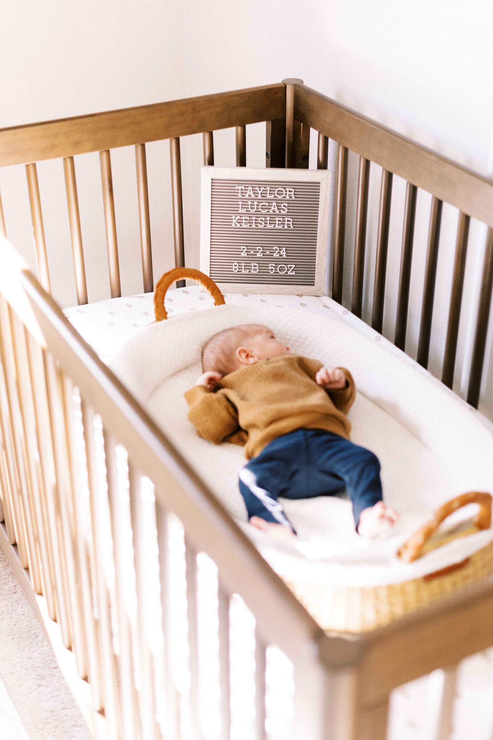 newborn baby in crib during peoria illinois newborn photos