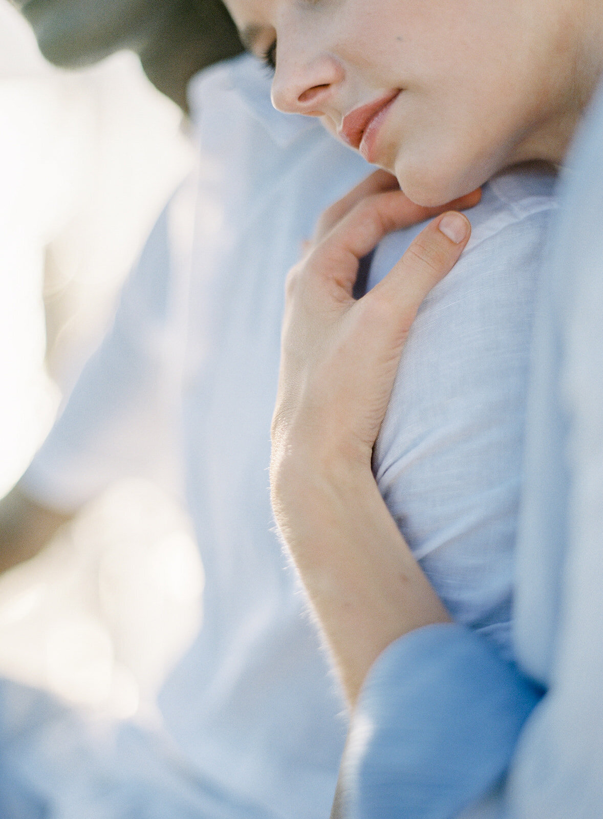 Charleston SC engagement session on sailboat photographed by wedding photographers in Charleston Amy Mulder Photography