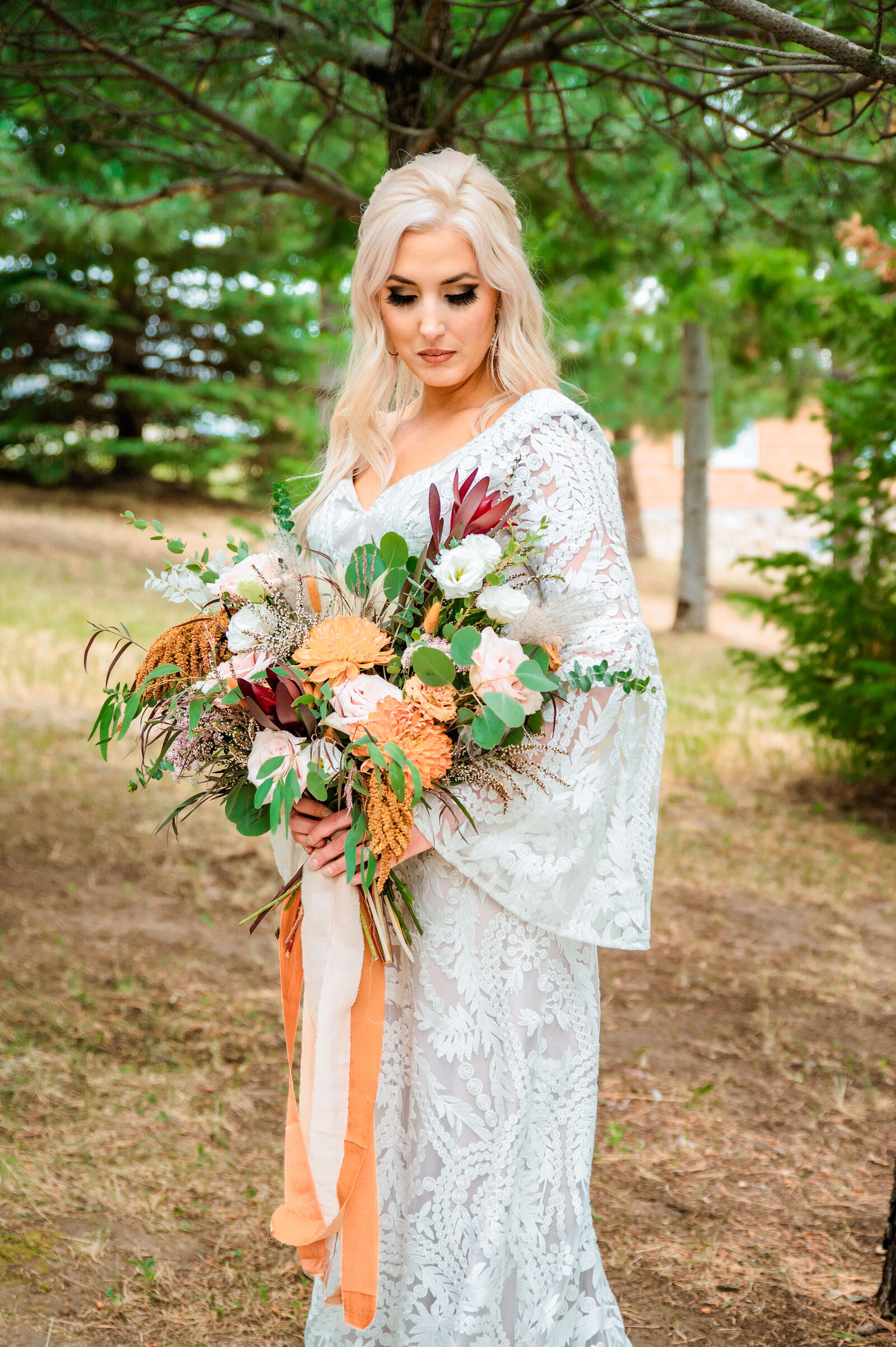 Jackson Hole videographer captures bride holding bridal bouquet