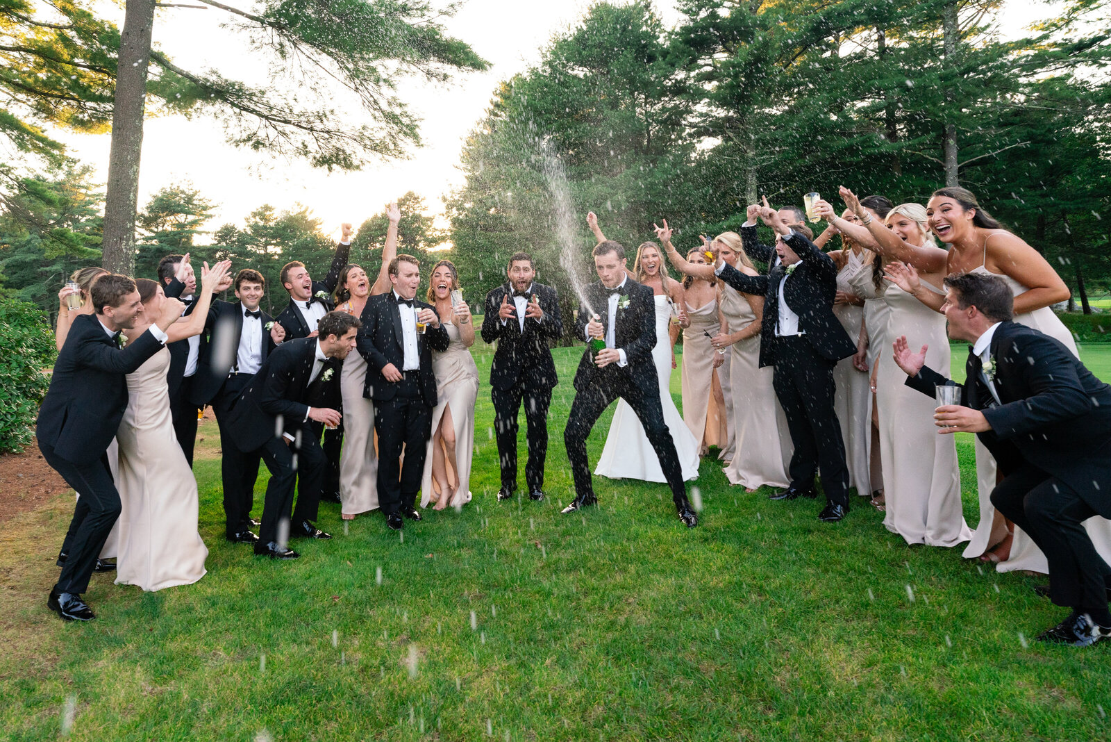 wedding party sprays champagne boston wedding