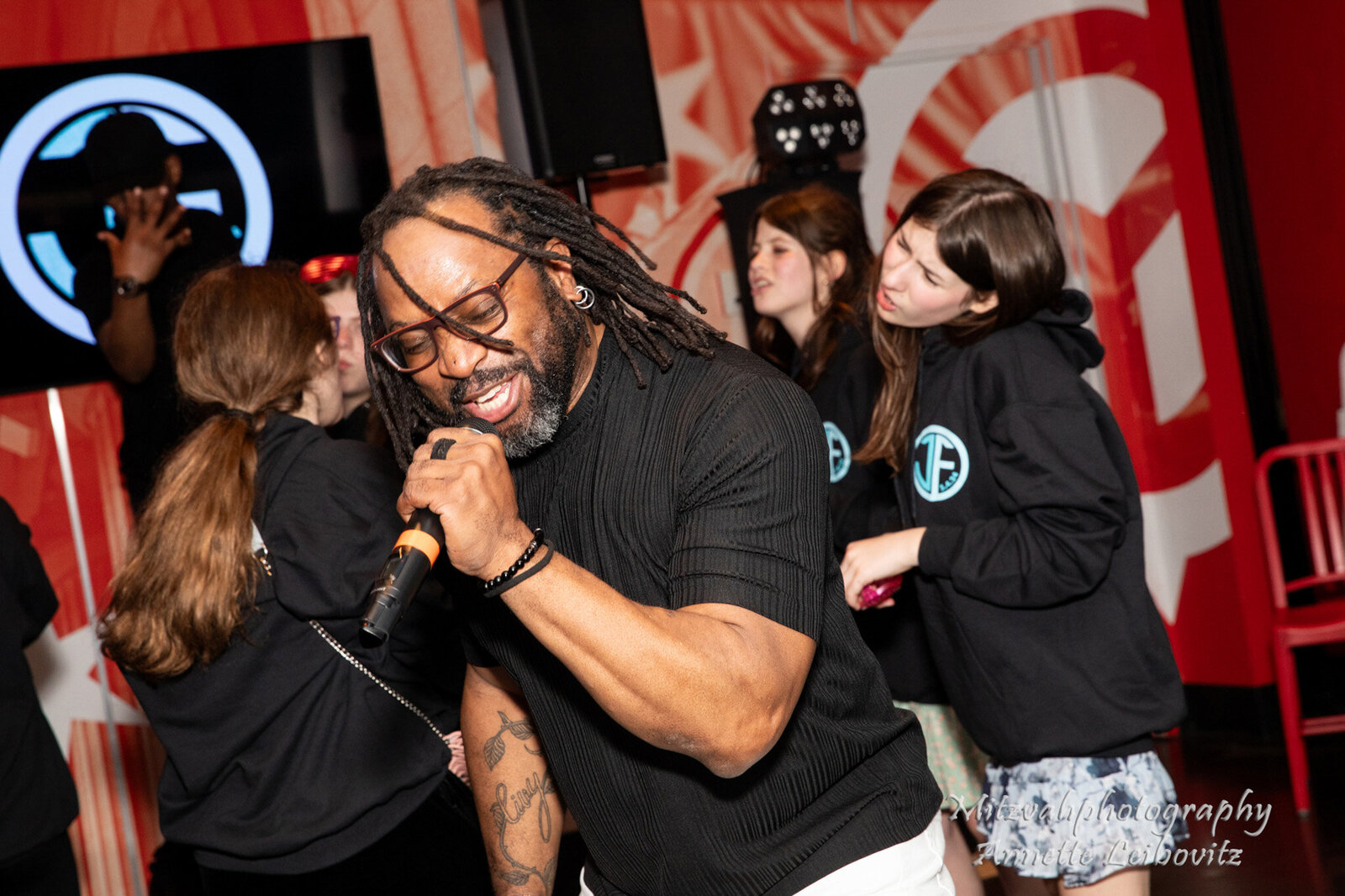 DJ Marz of charizma entertainment dancing in the crowd.