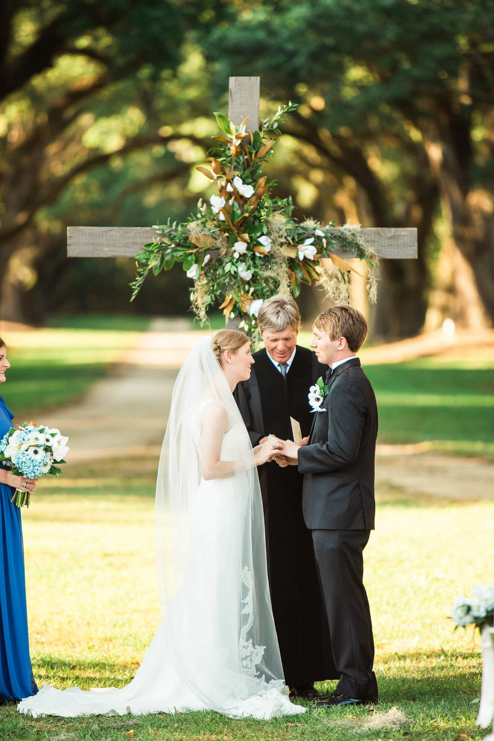 Bride and groom exchange vows, Oakland Plantation, Mt Pleasant, South Carolina