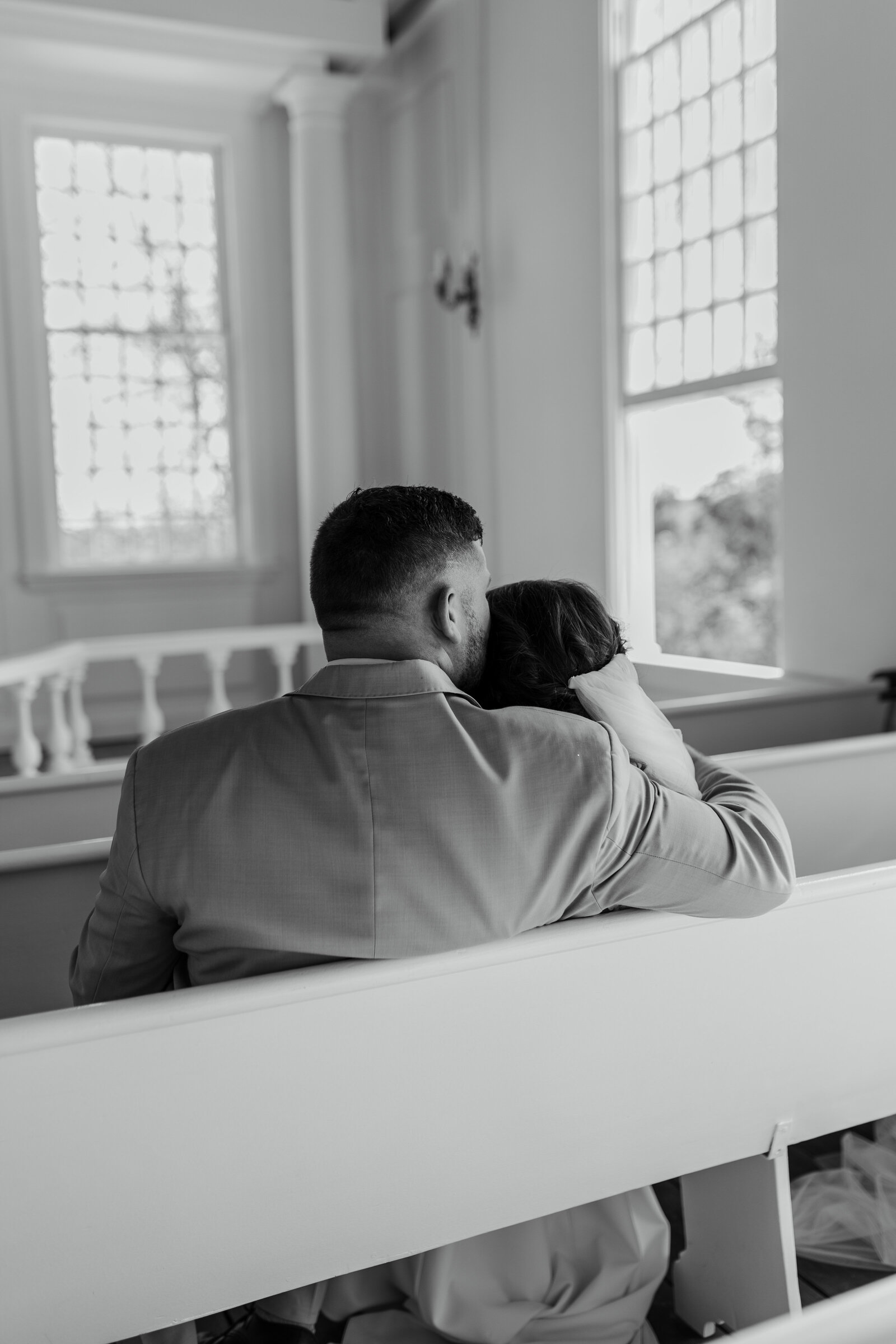 Daniel Boone home wedding portraits in the old white chapel. Defiance, Mo wedding