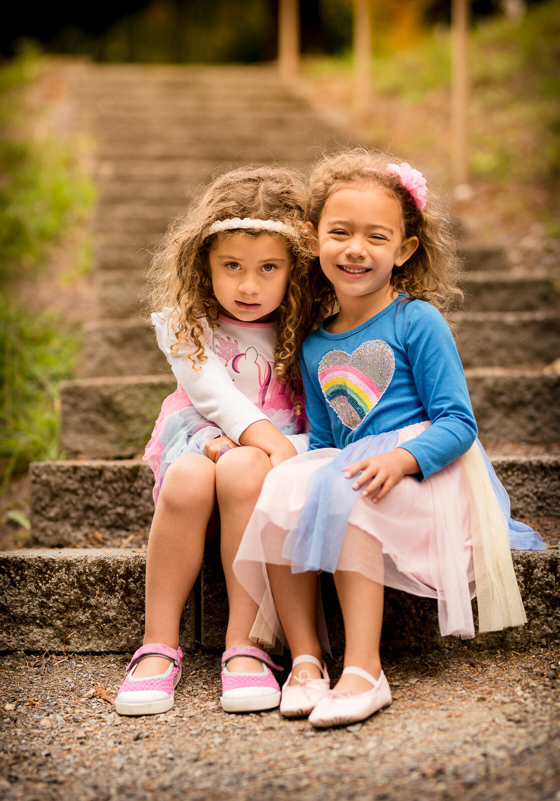family-portraits-twins-sitting-on-steps