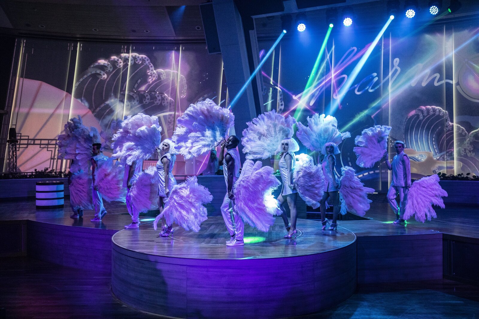live theater with lighting dancers and costumes