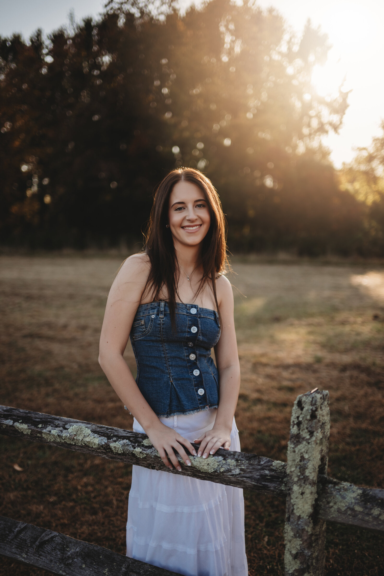Experience the magic of golden hour with a stunning high school senior portrait session in Connecticut. Capturing warm, natural light and a rustic setting, this session highlights your unique style and personality.