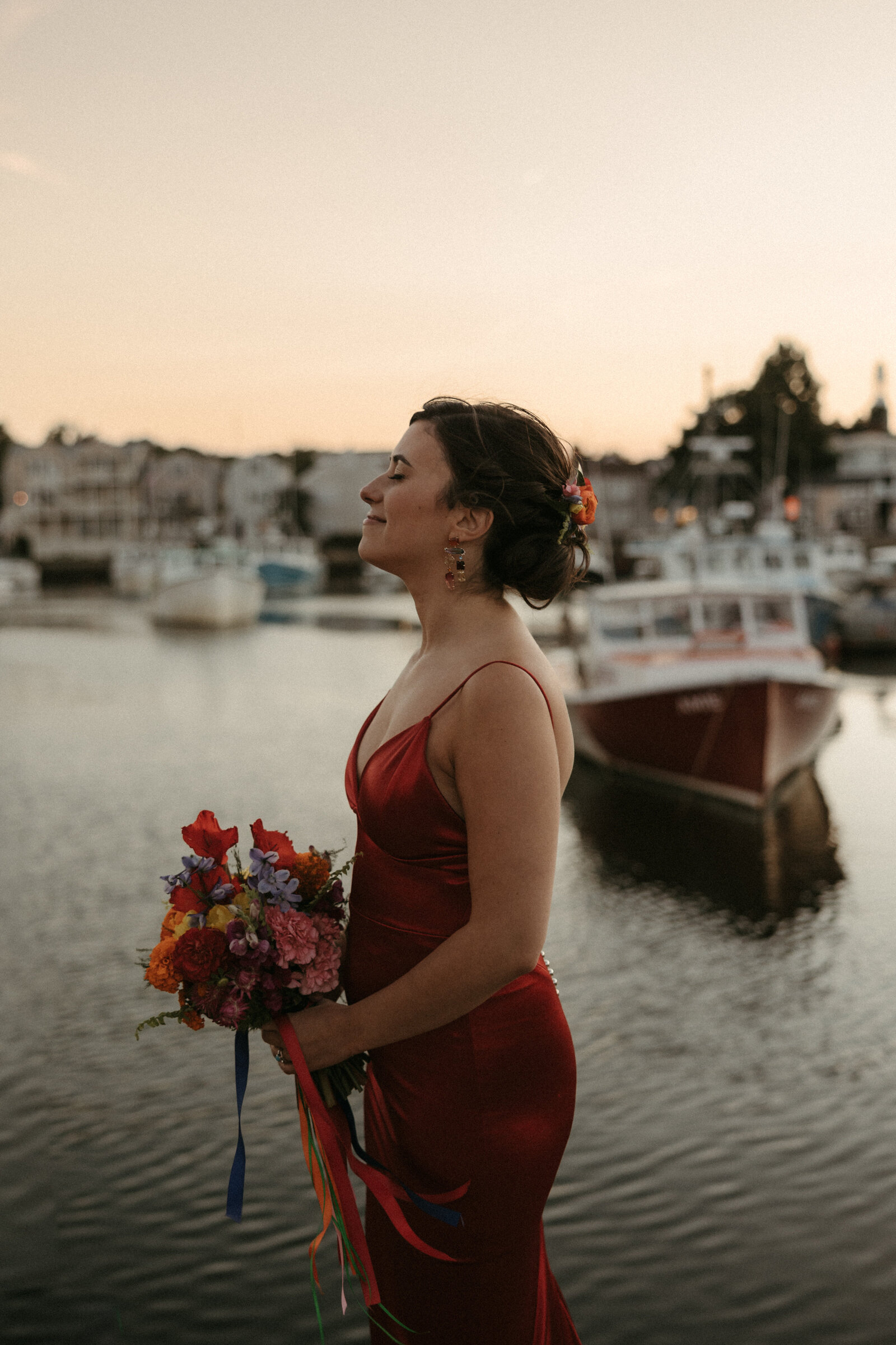 Caroline Giuliano photo of Boston Bride holding Prose Florals bright and vibrant  bouquet