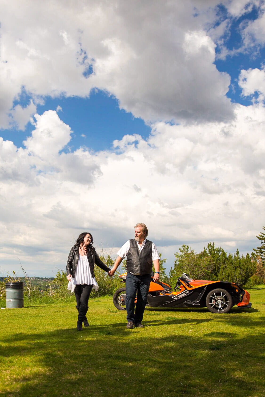 Engagement session with special car in background