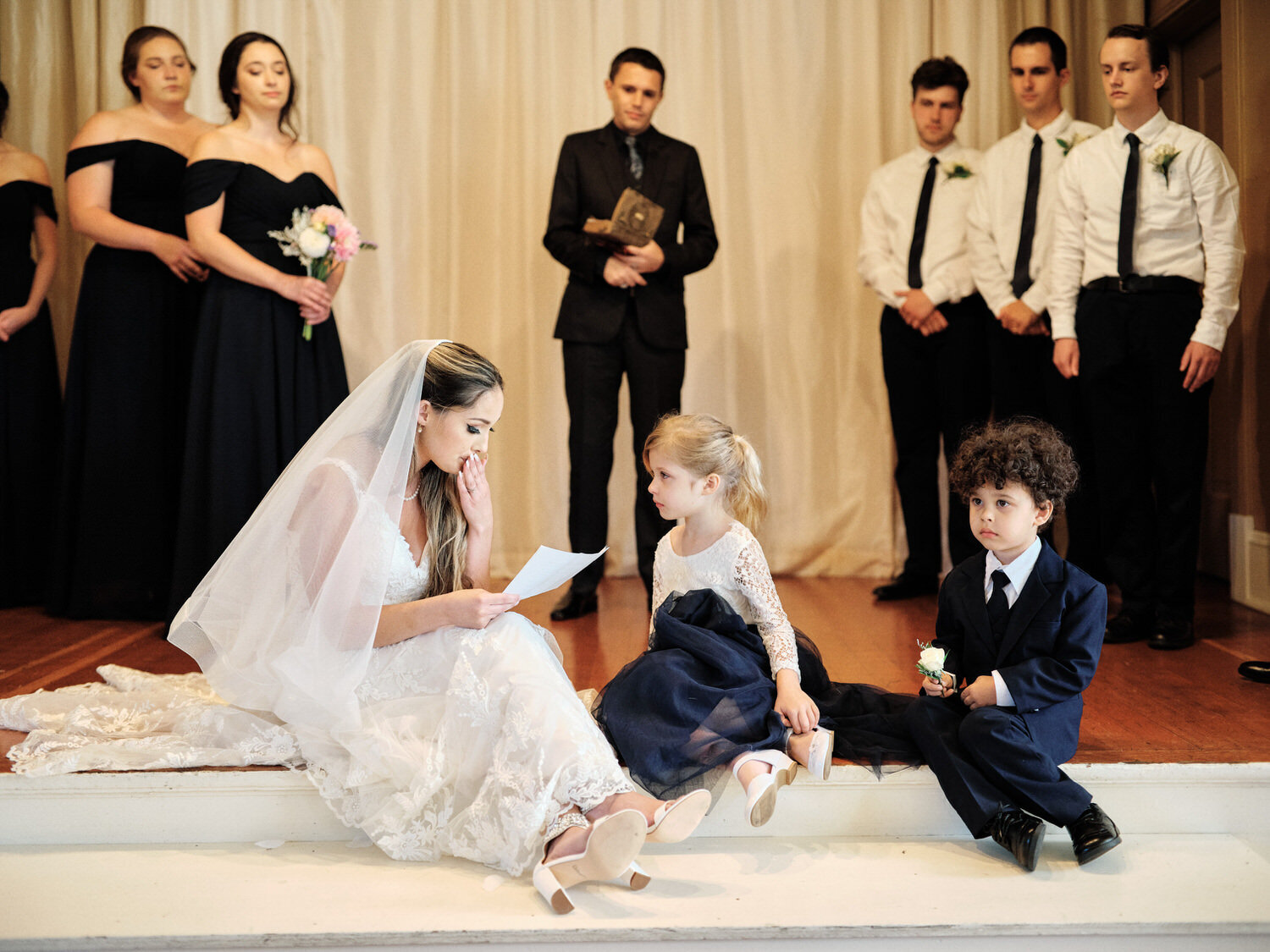 Bride reads special vows to her adopted children.