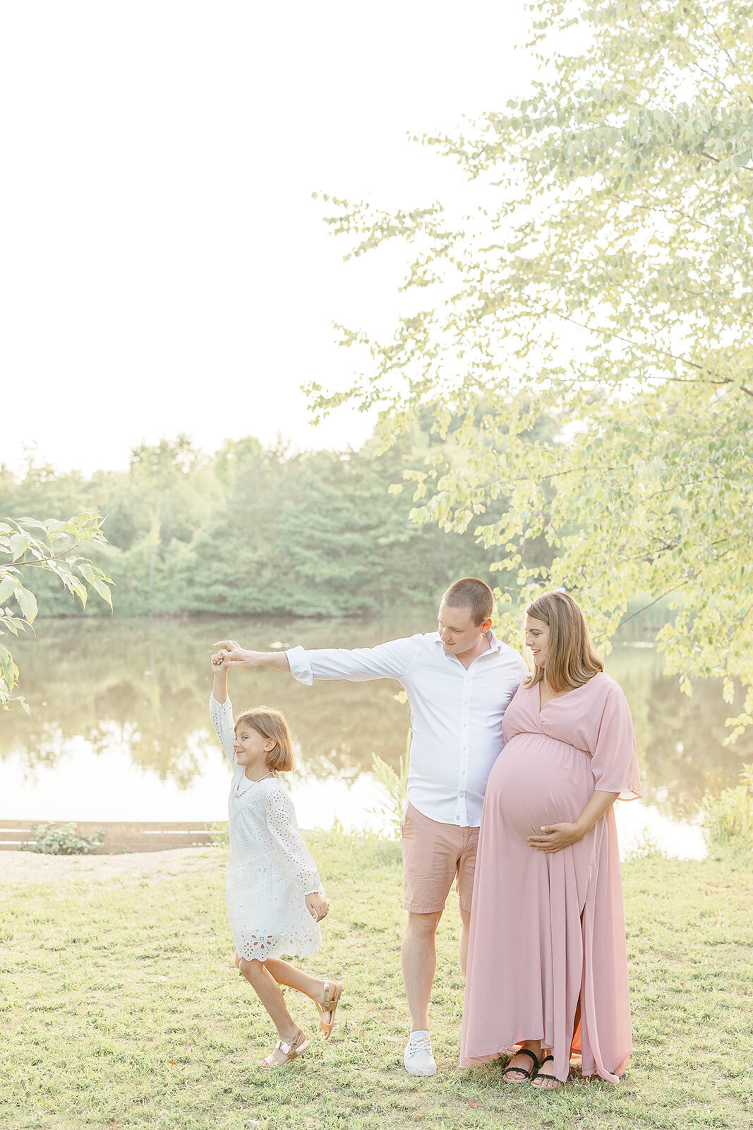 dad twirling daughter in Gainesville,Virginia