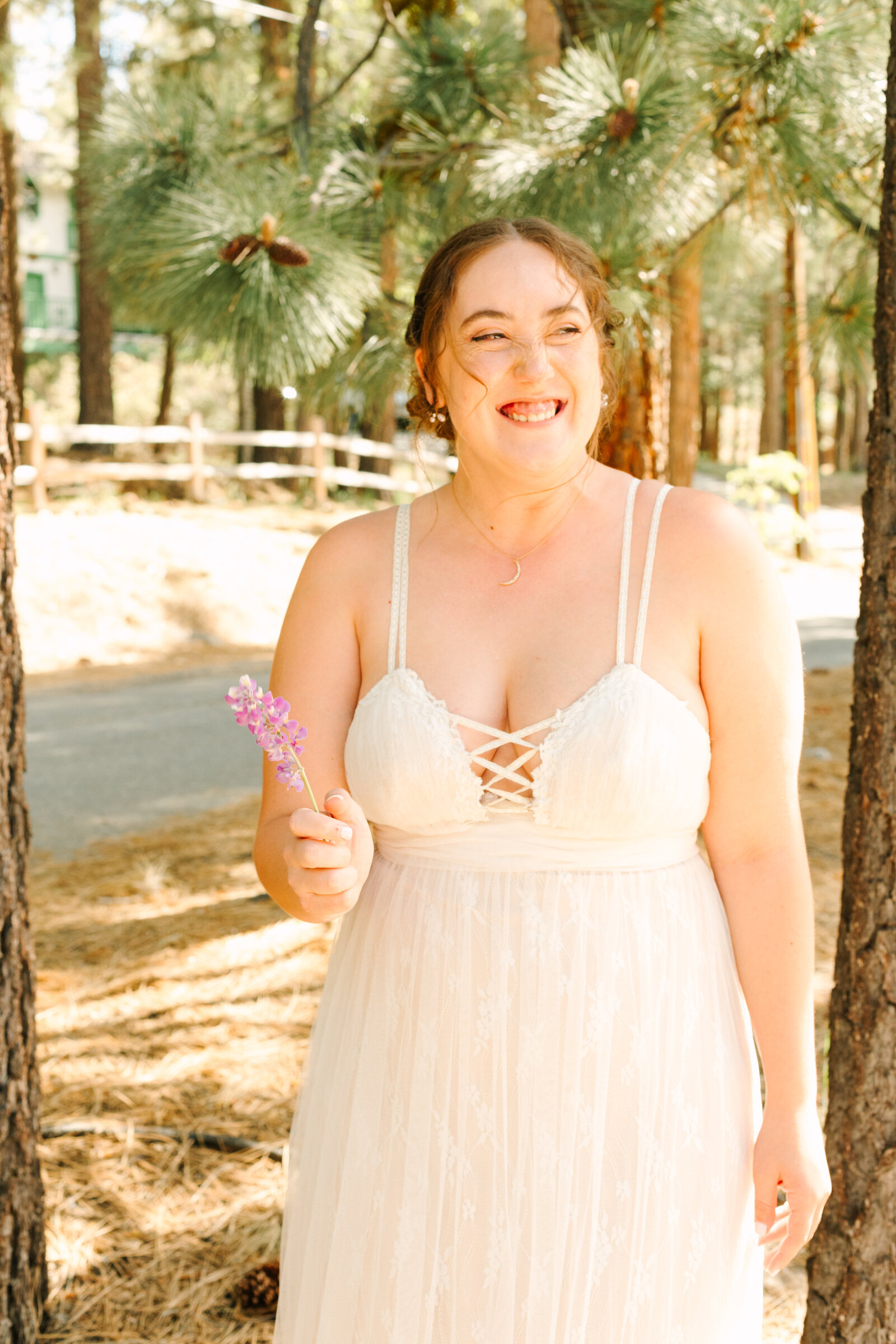 A boho bride celebrates her intimate elopement at a cabin at Big Bear Lake, California.