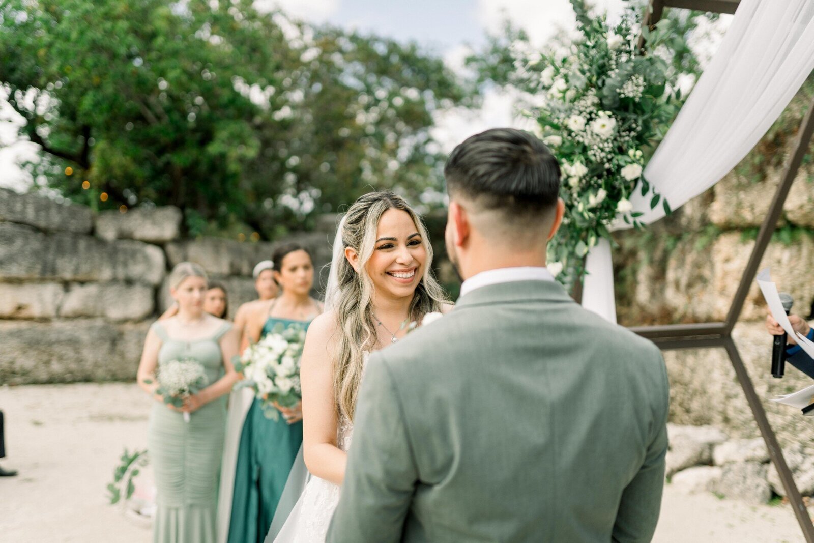 bride and groom saying i do