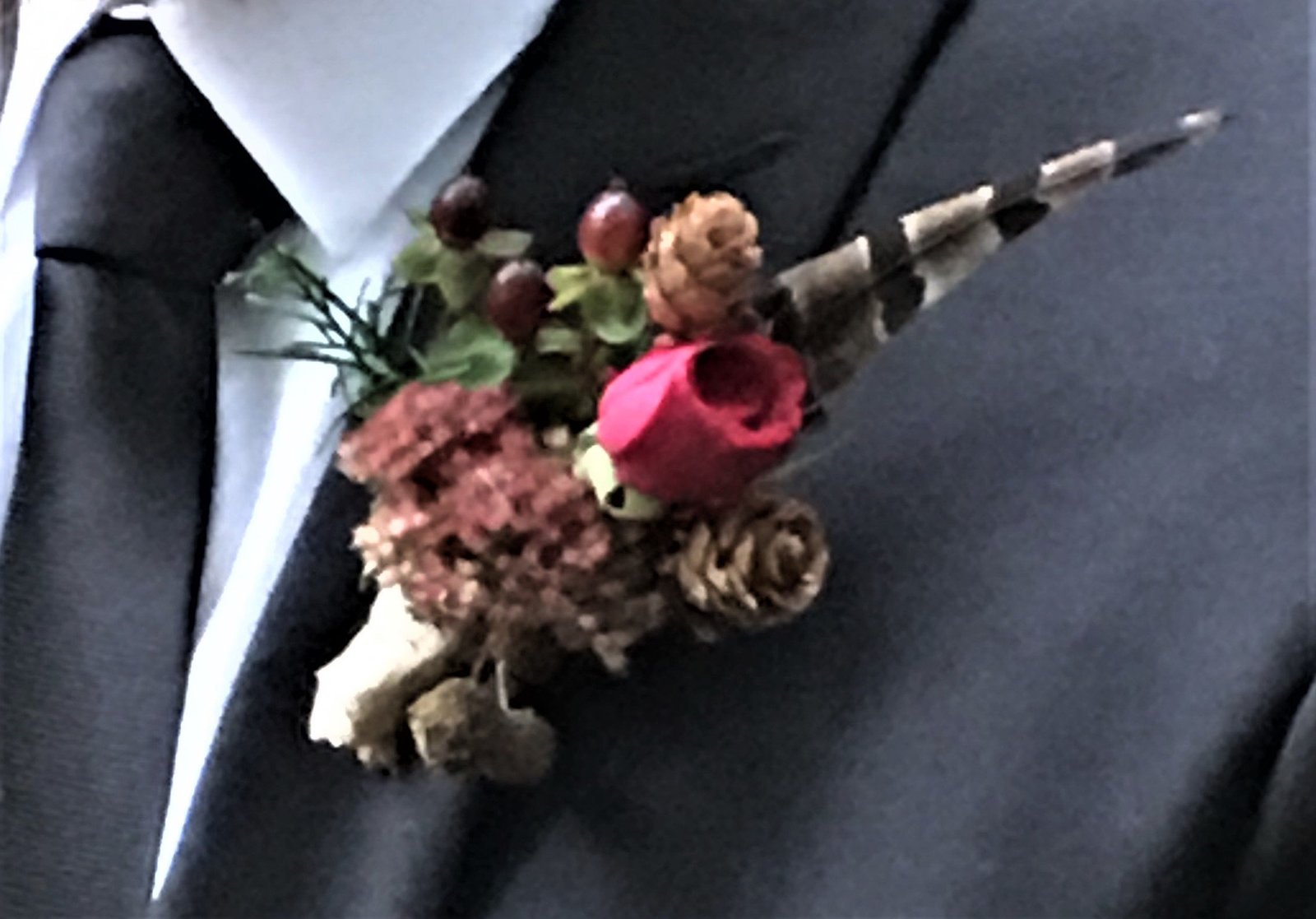 Natural boutonnière for groom