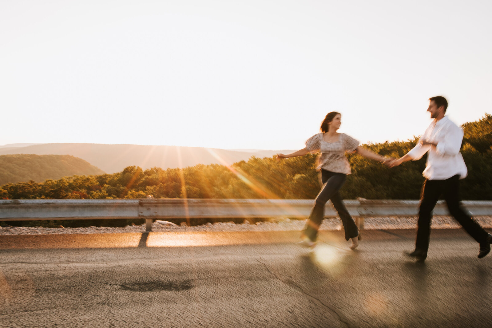 Couple running at sunset