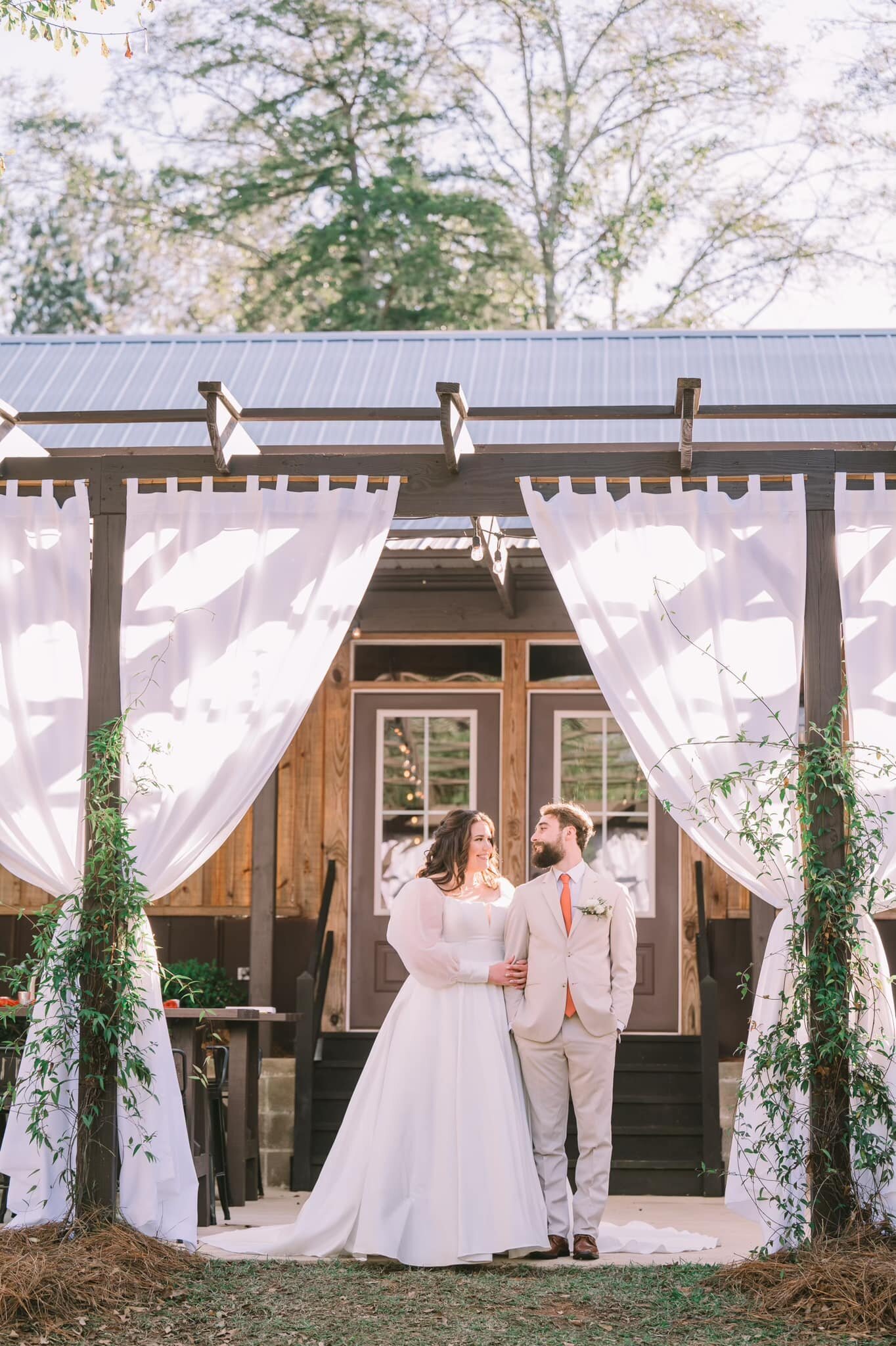 Couple with greenery vines