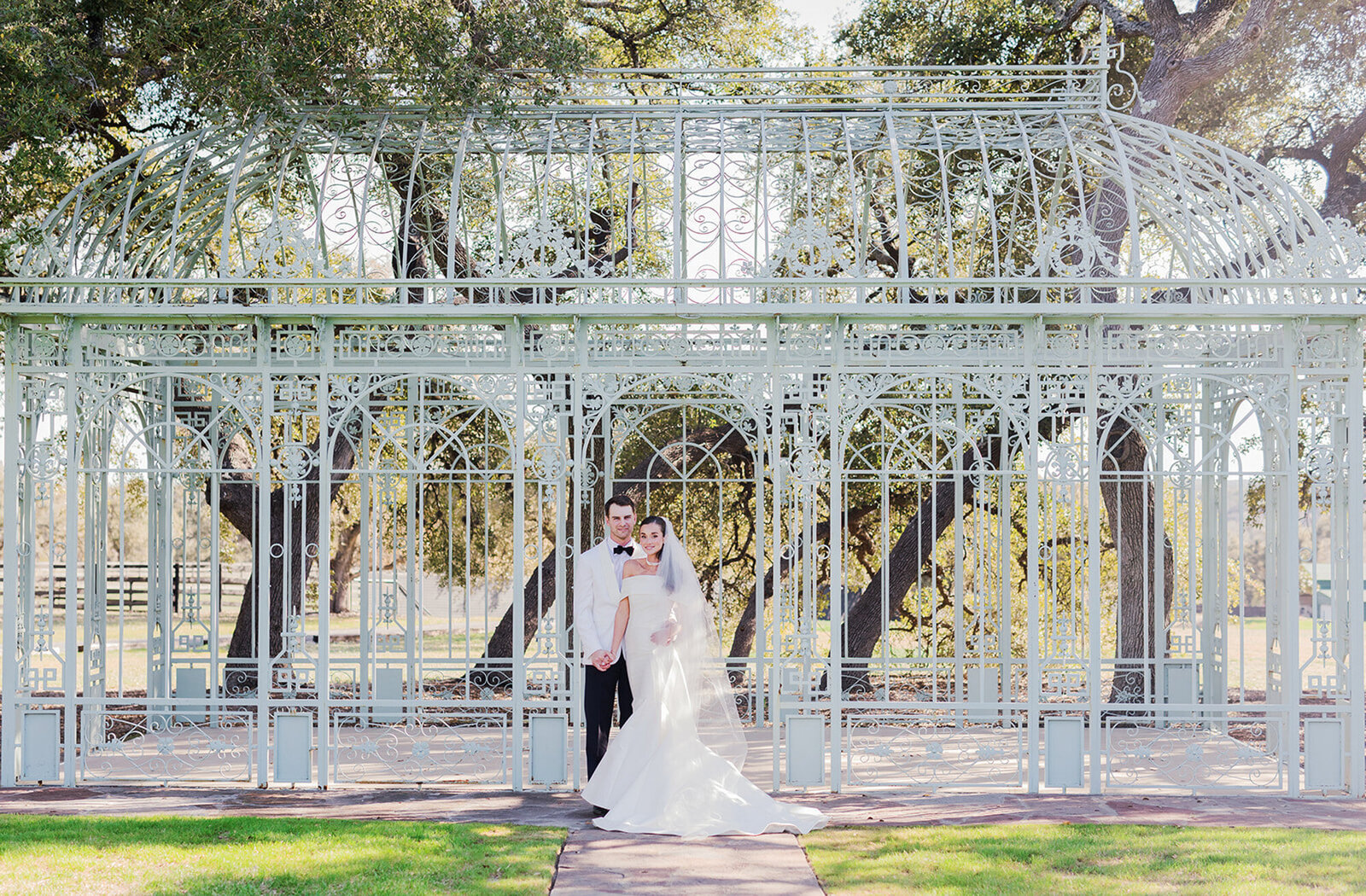 Emily and Colton's wedding at Ma Maison green cathedral