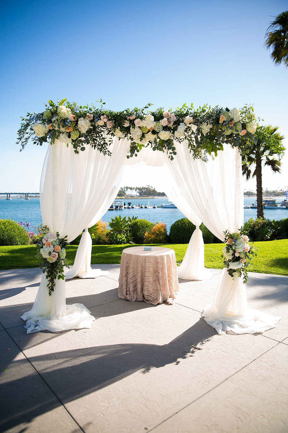 beautiful ceremony arch with flowers