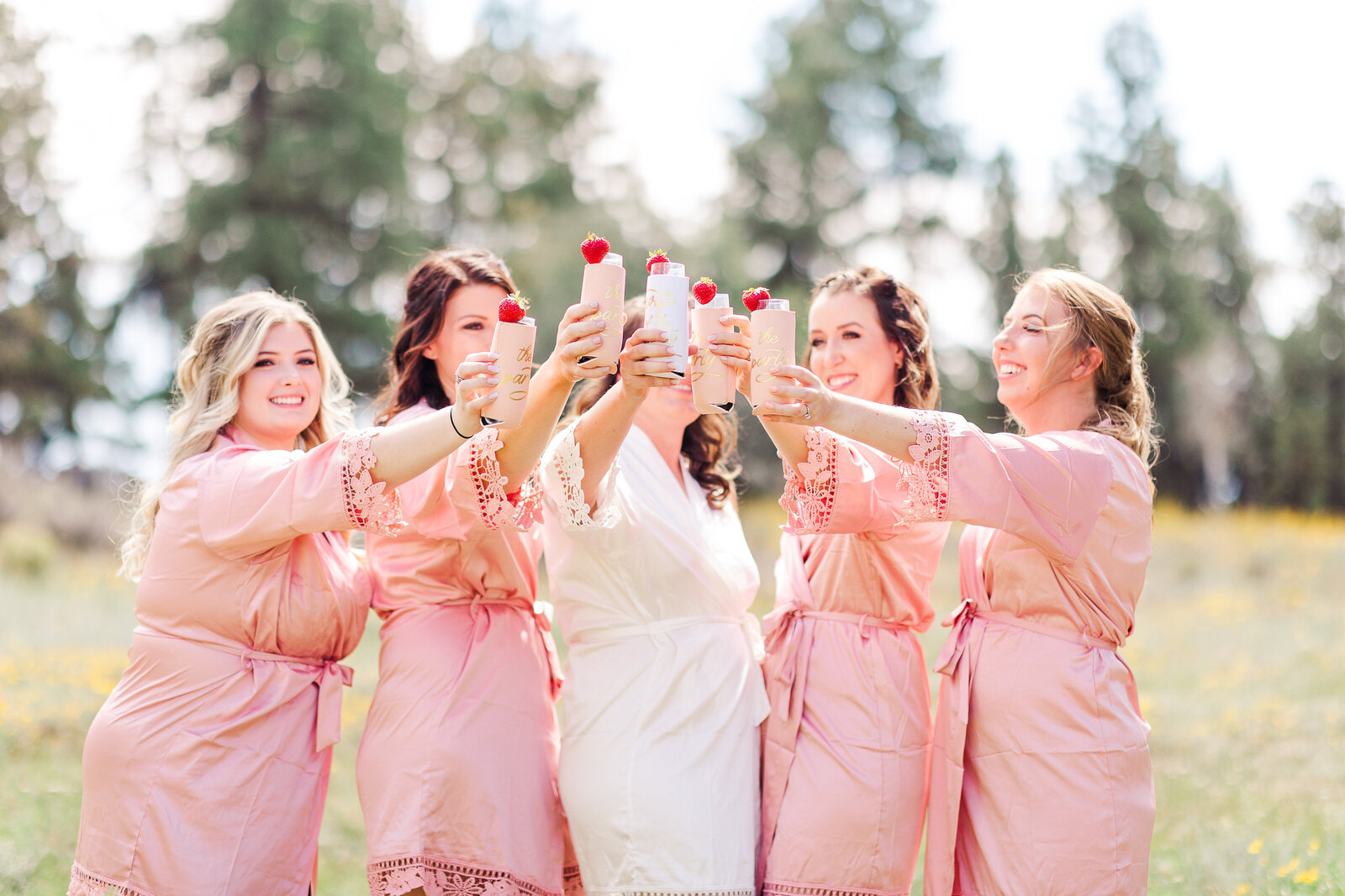 bridesmaids toasting champagne glasses