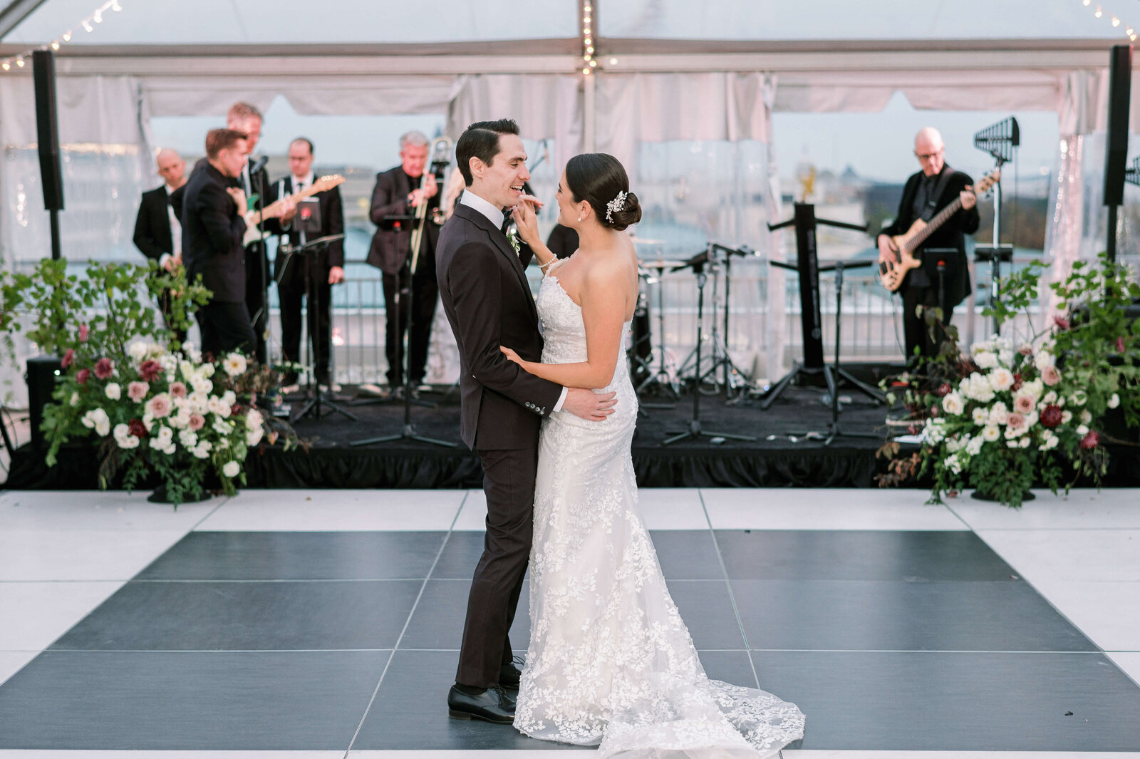 Couple dance together during a private dance at their Virginia Wedding