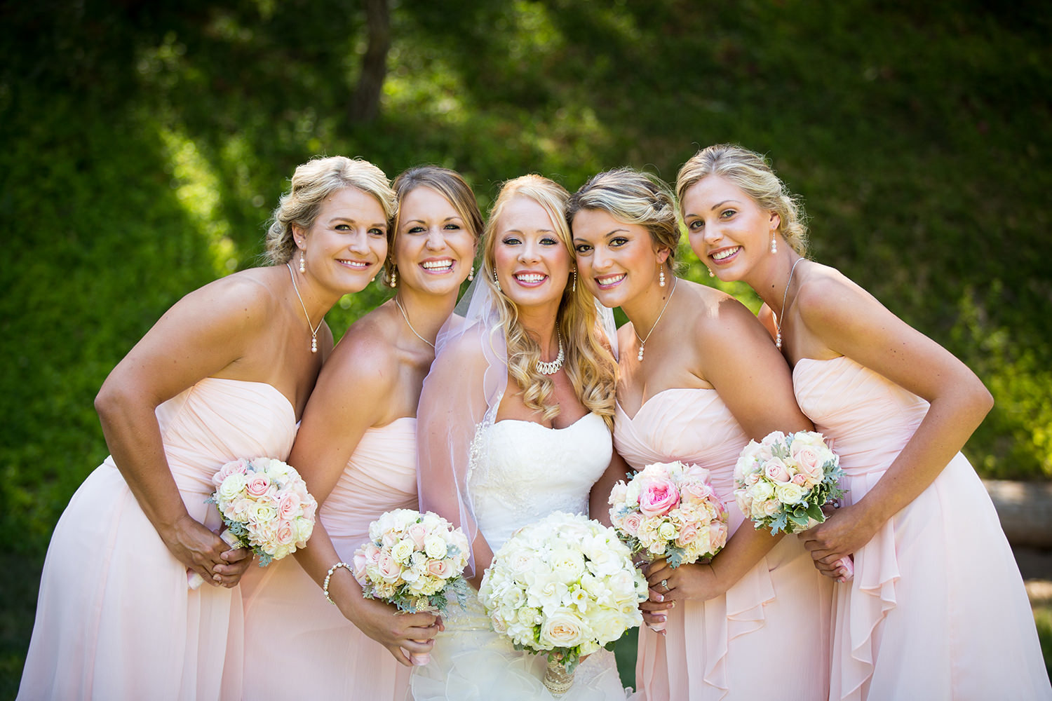 bridesmaids in pick dresses