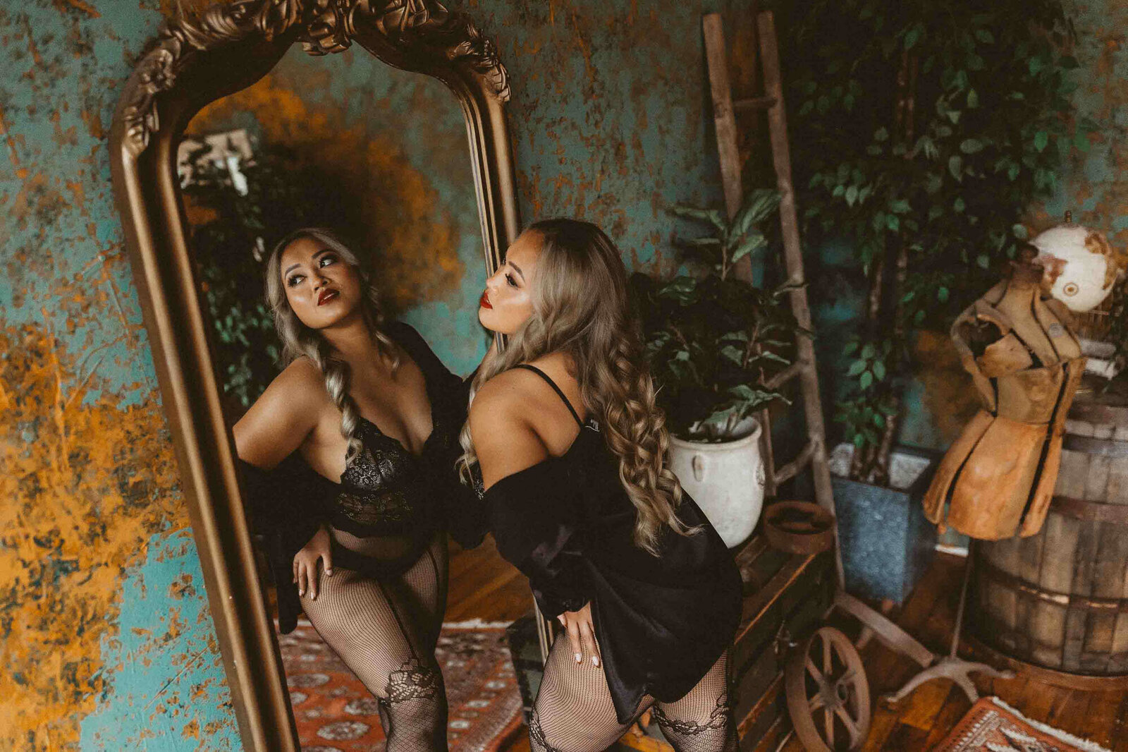 woman fiercely posing in front of a mirror