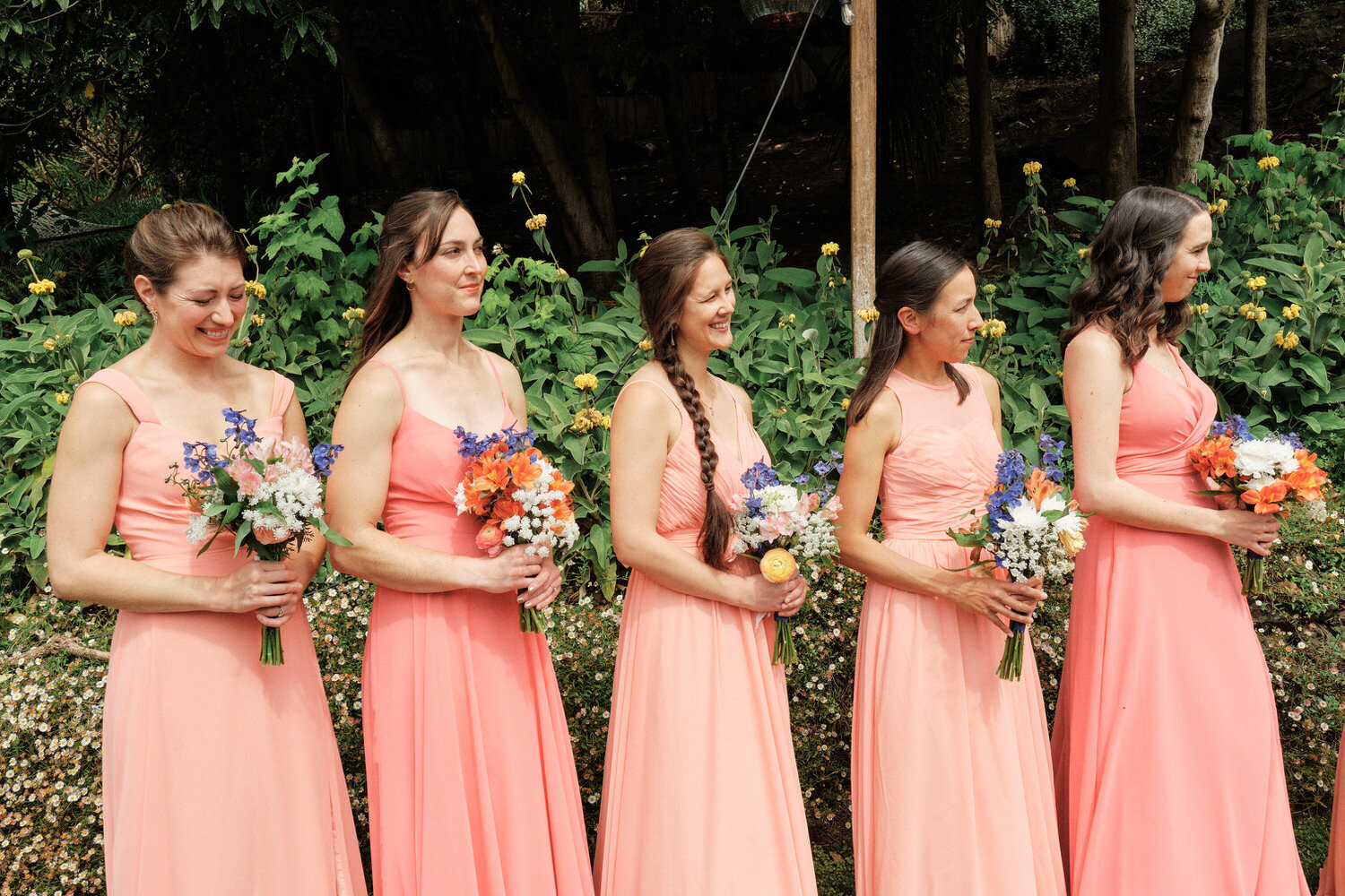Bridesmaids watching the ceremony.