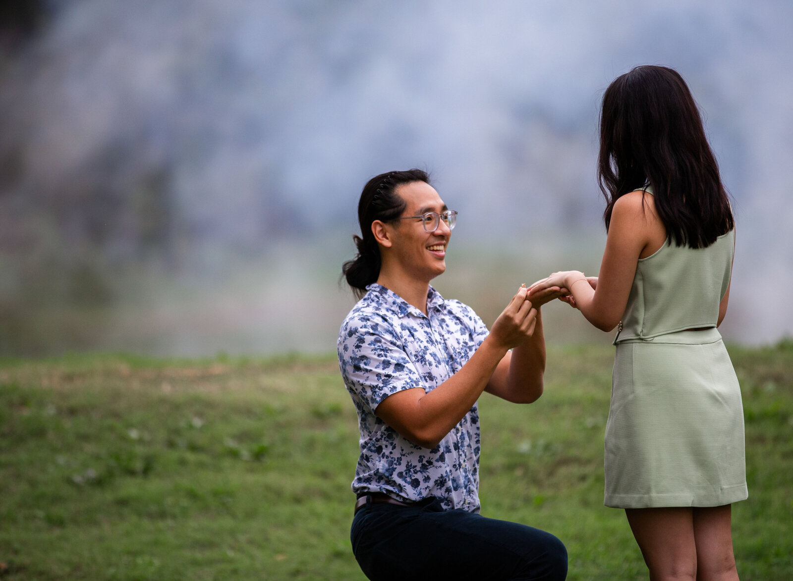 guy proposing with fireworks