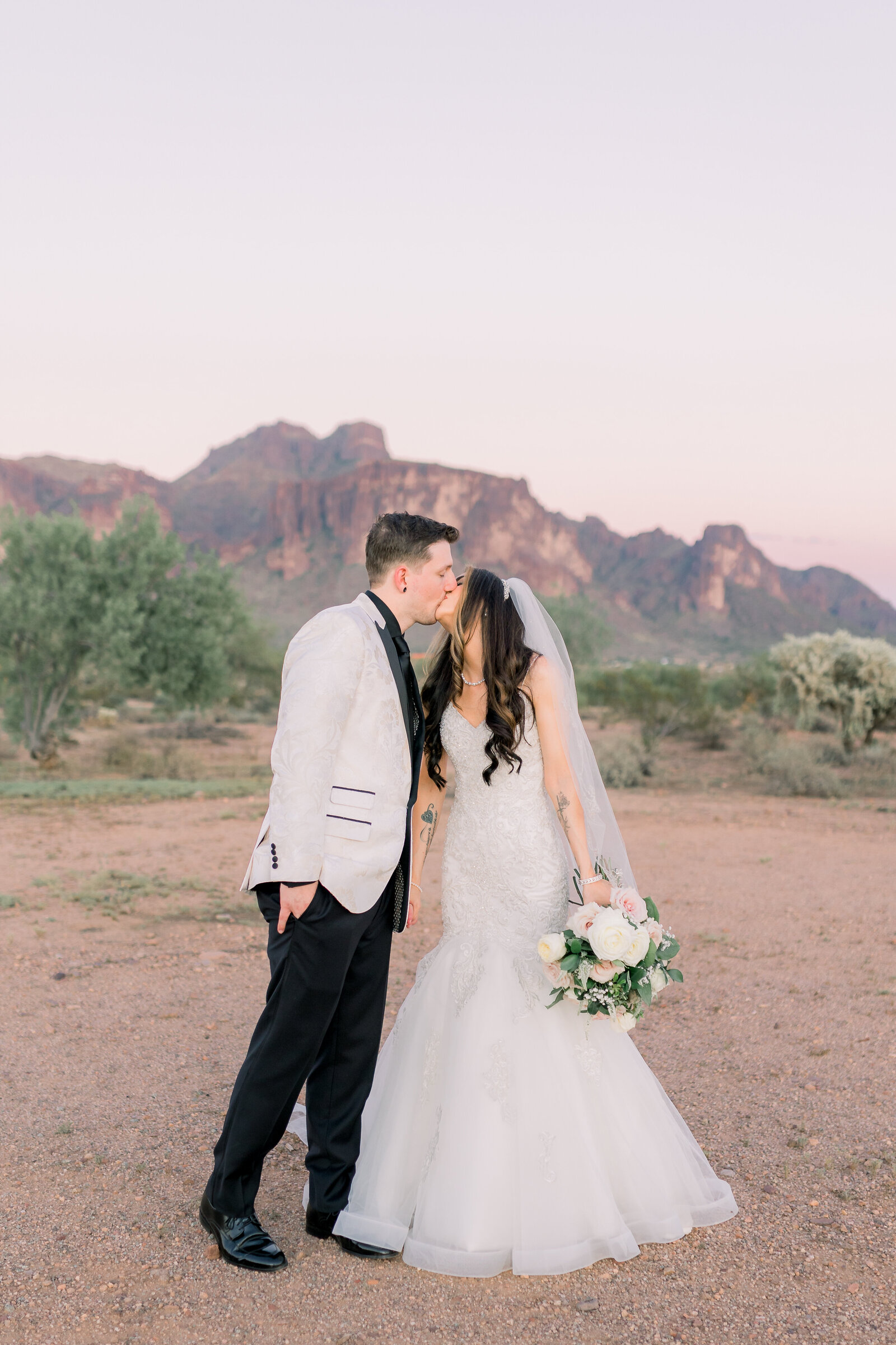Husband and wife wedding portraits at Superstition Mountains at the Paseo wedding venue