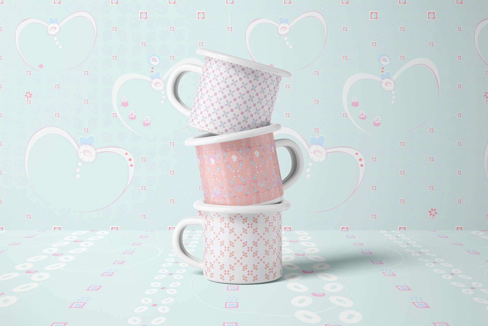 pink and white patterned coffee mugs