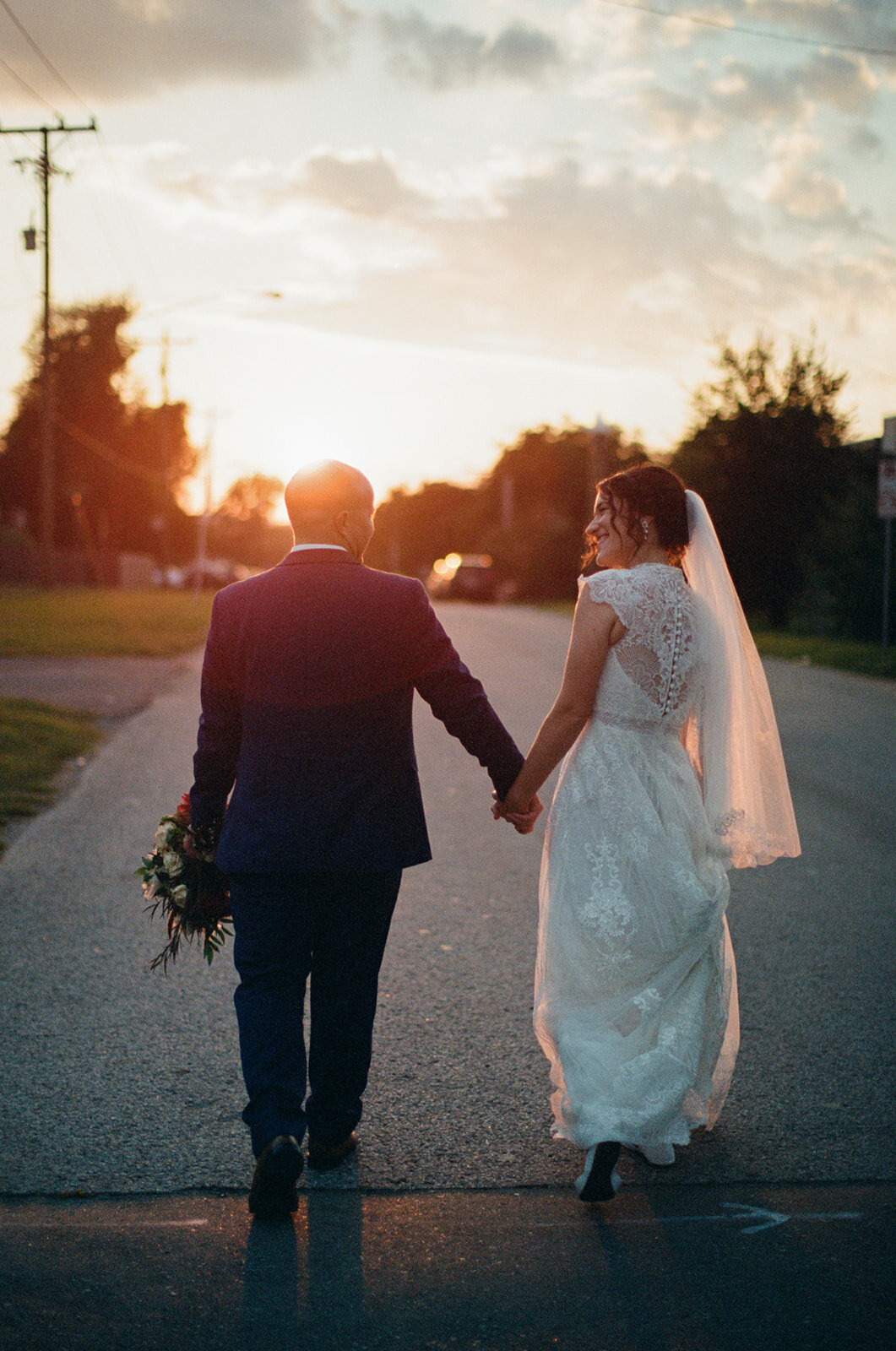 Bride and groom in the sunset on film at a fat bottom brewery wedding