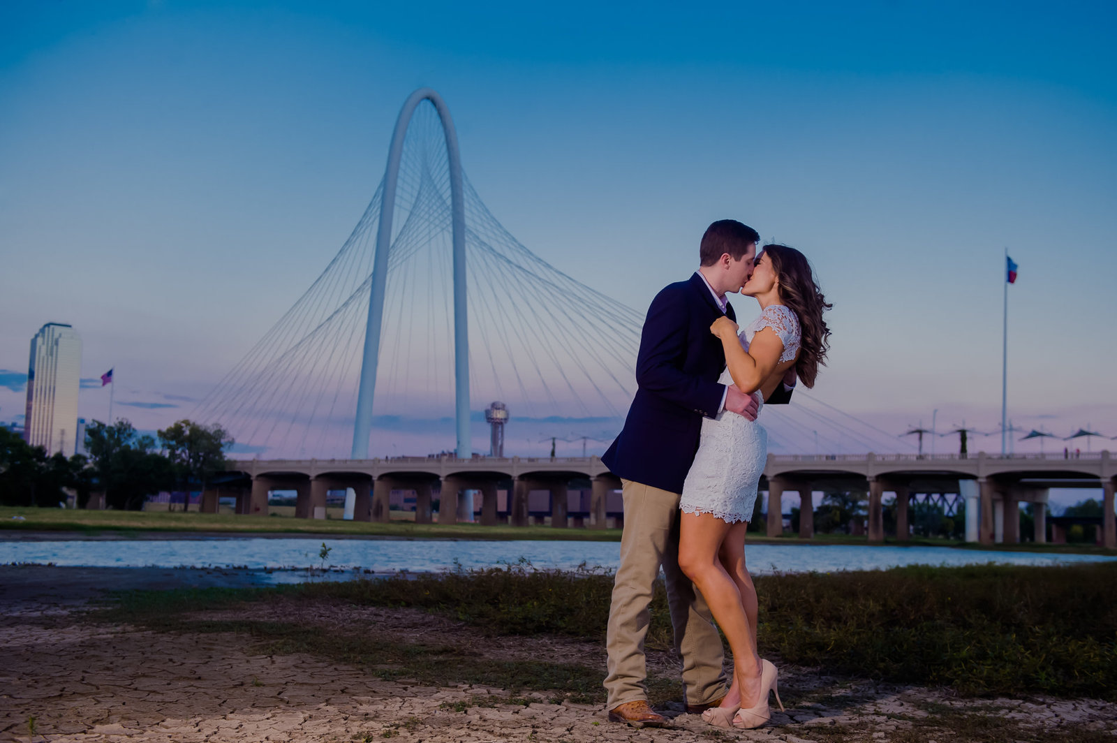 Dallas engagement photo with bridge