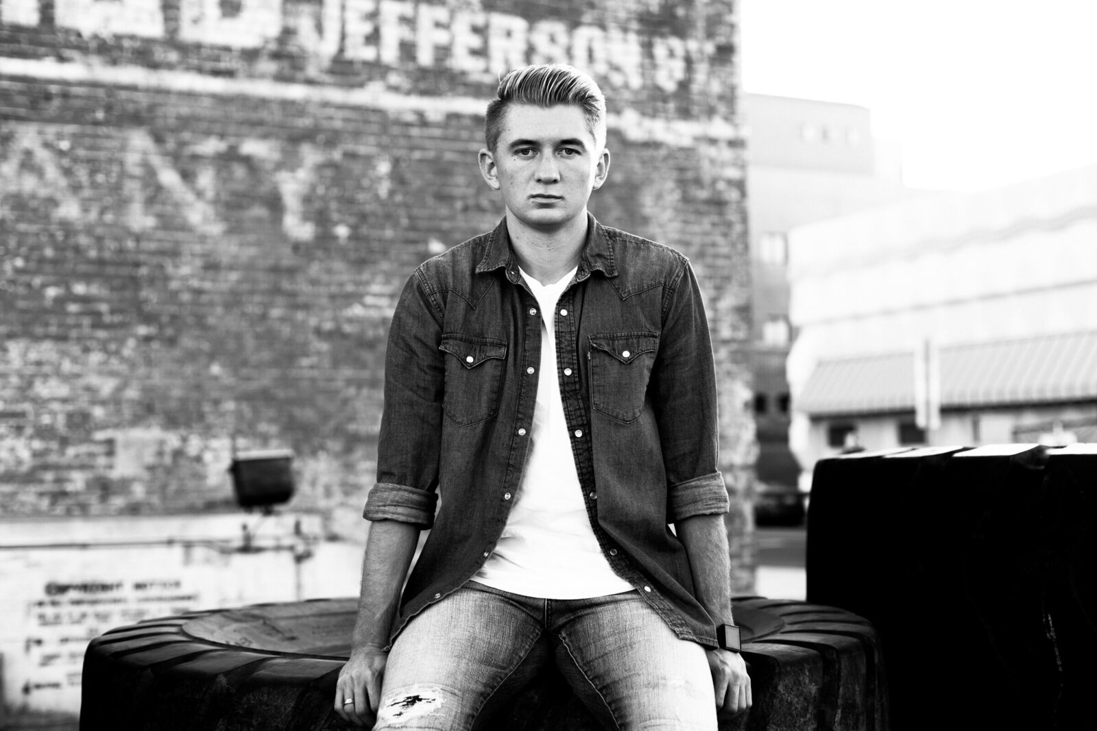 college senior boy posing in downtown Phoenix