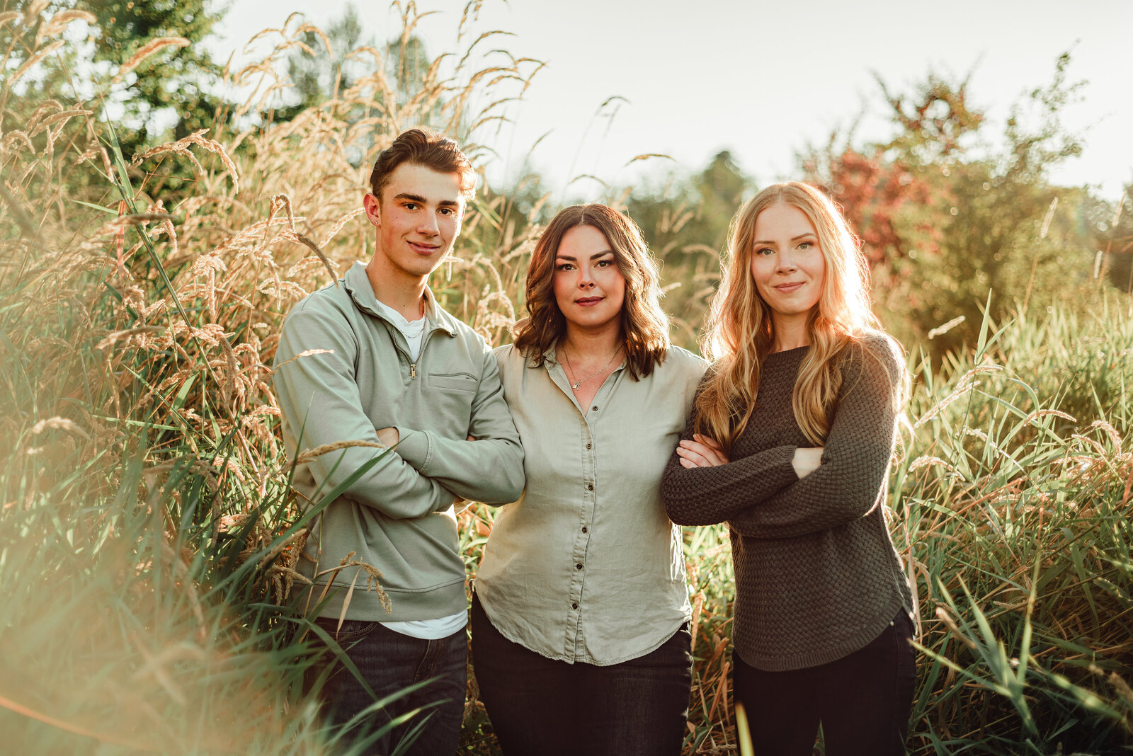 Three Siblings in a beautiful grassy field