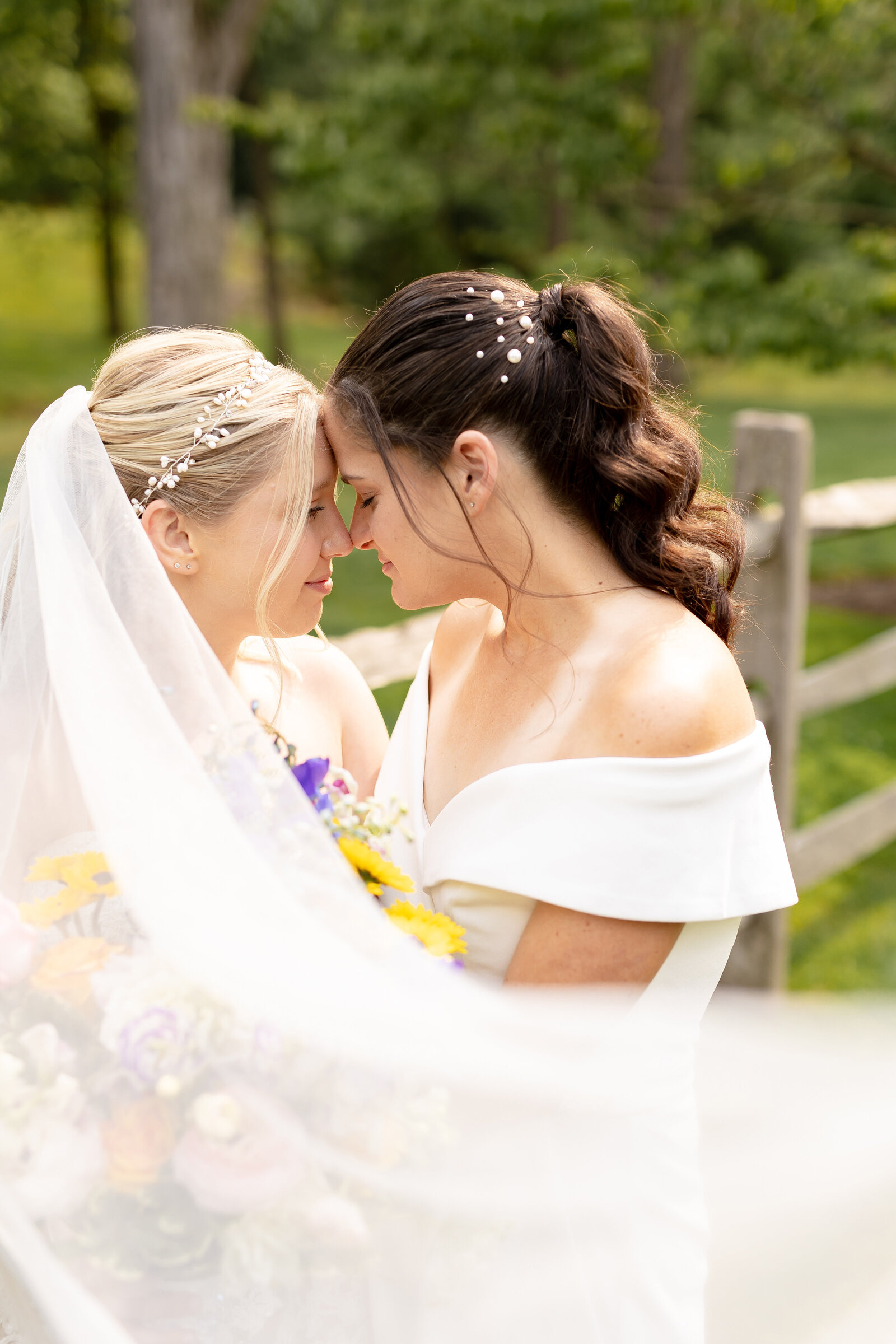 bride and bride embracing moment