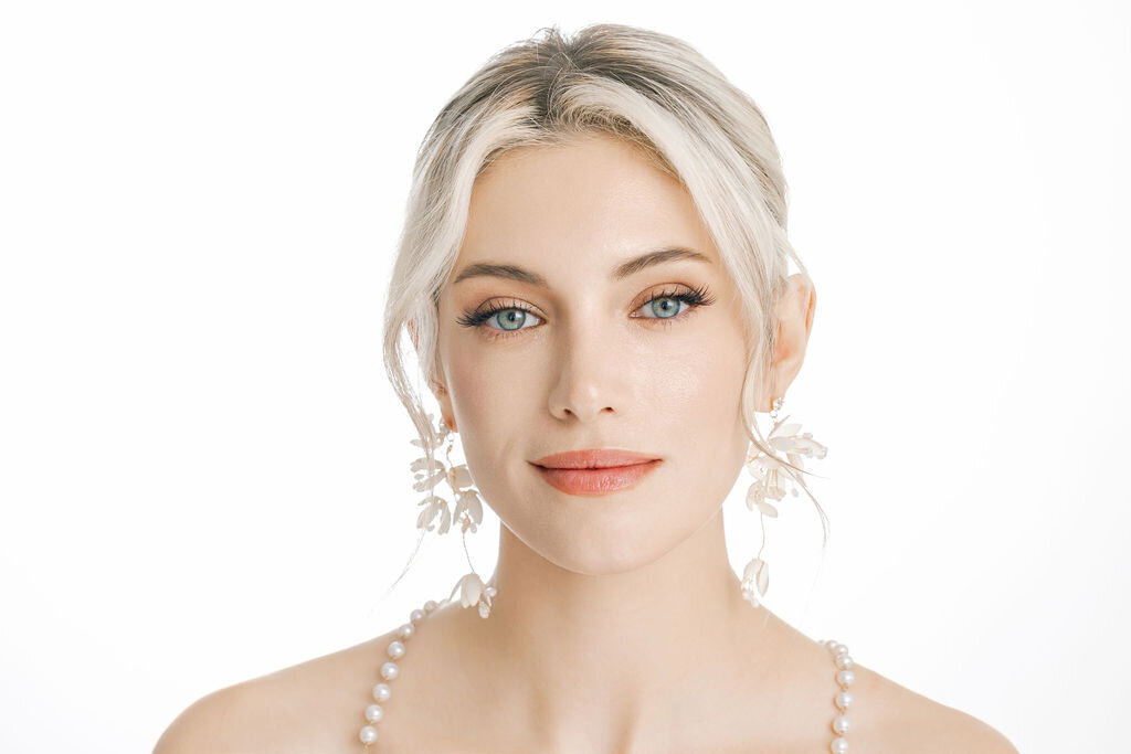  Bride-to-be at trial session with soft bridal waves and natural glam makeup by Yana in San Jose.