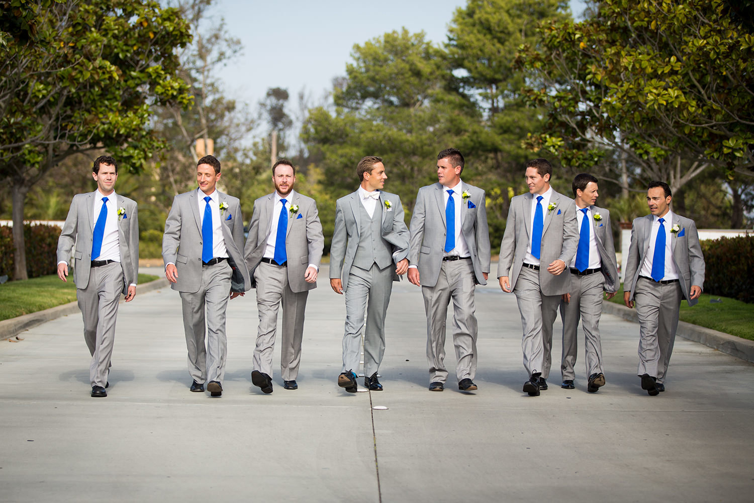 groomsmen walking serious