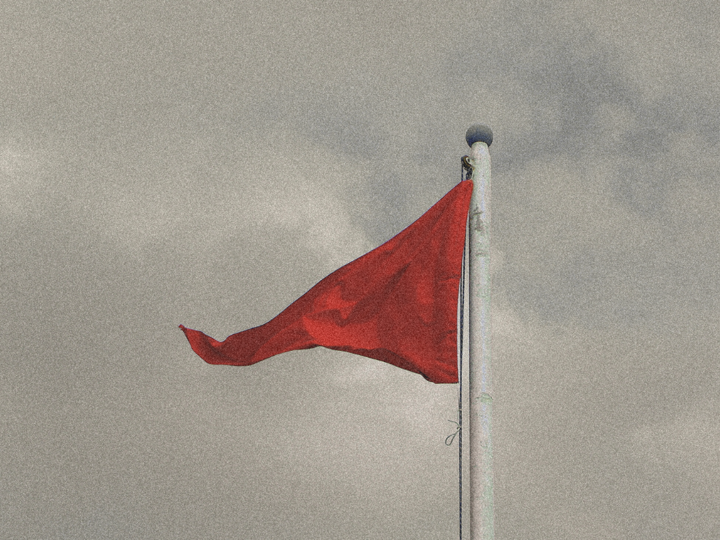 A warning sign that your relationship is not healthy. A red flag graphic.