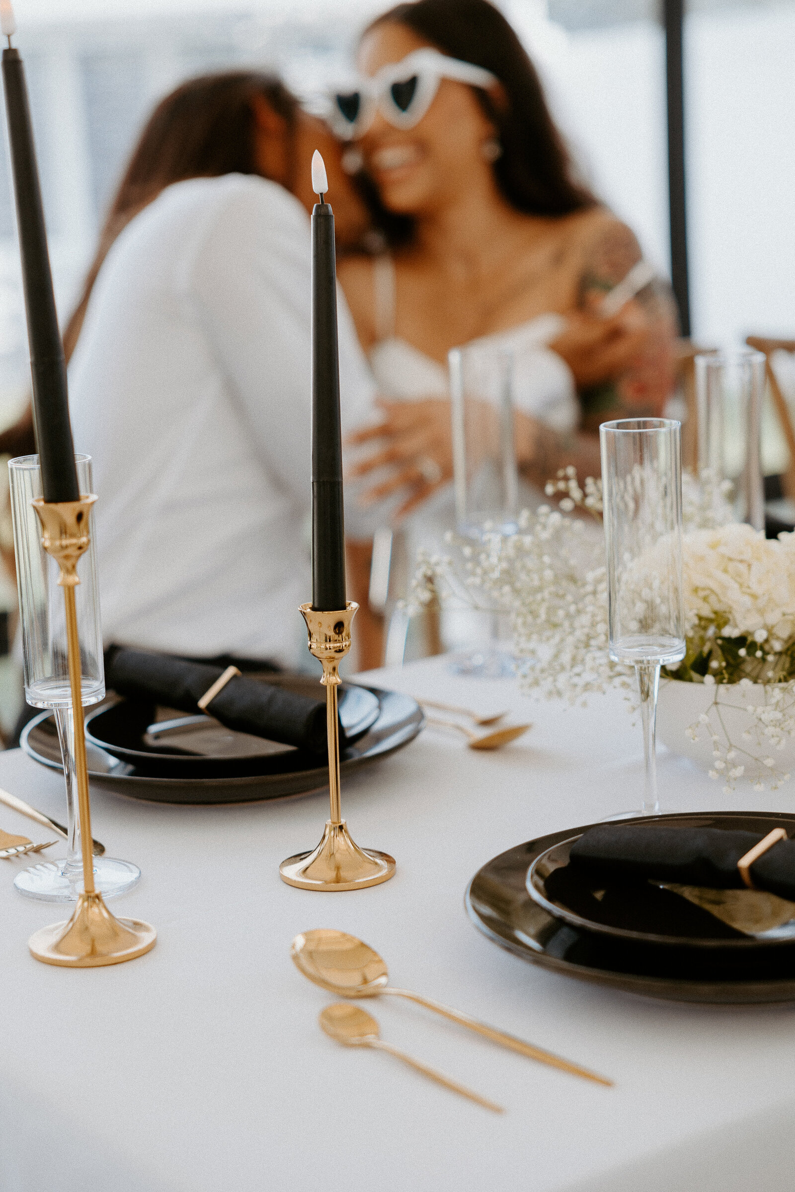 Maryland wedding photography showing a couple at their sweetheart table photographed by Pittsburgh wedding photographer