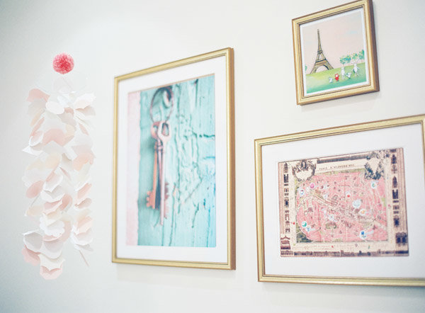 Framed fine art gallery wall in a nursery.