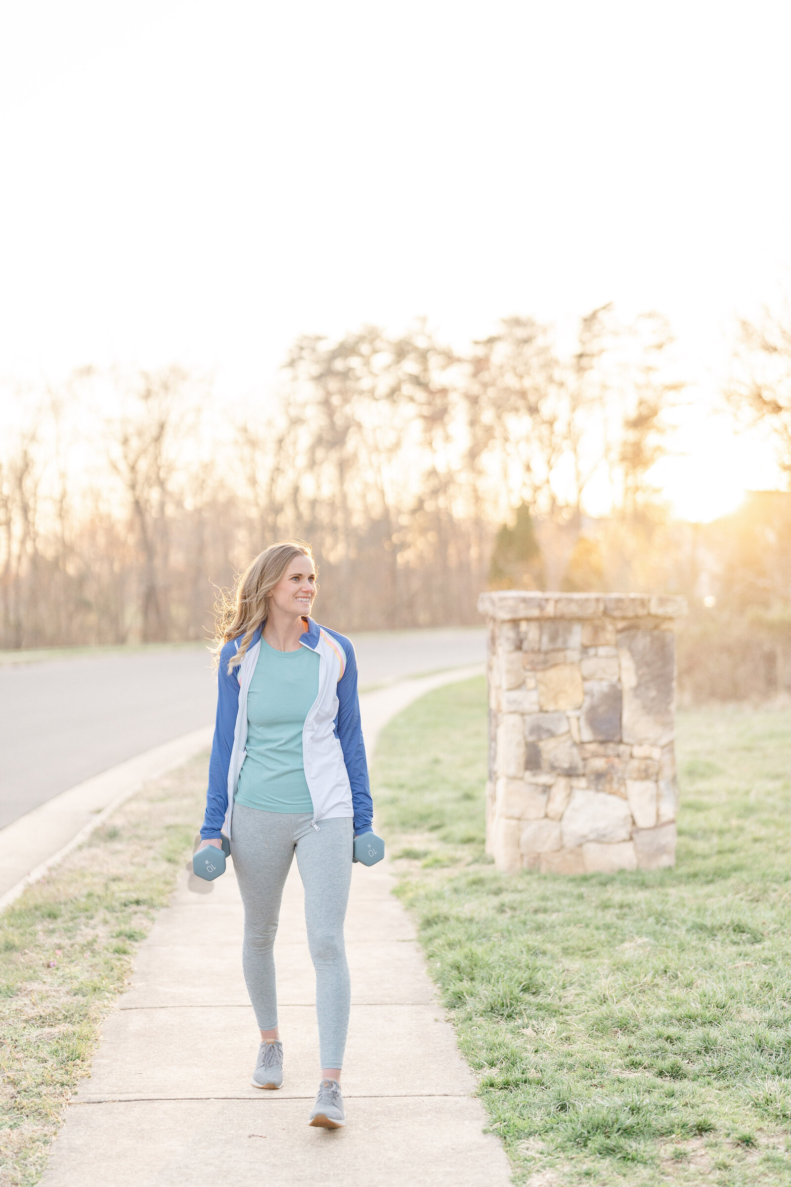 woman walking during sunset taken by branding photographer Chantilly,VA