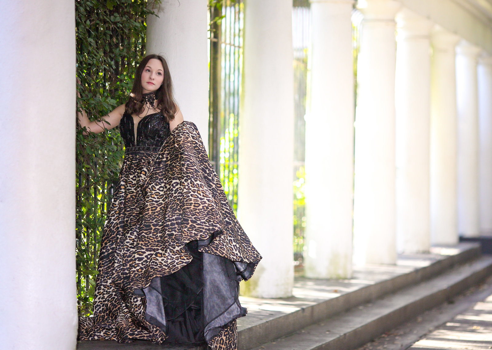 Savannah Boudoir Photography and Glamour showcases gorgeous brunette girl in designer animal print gown at Forsyth park