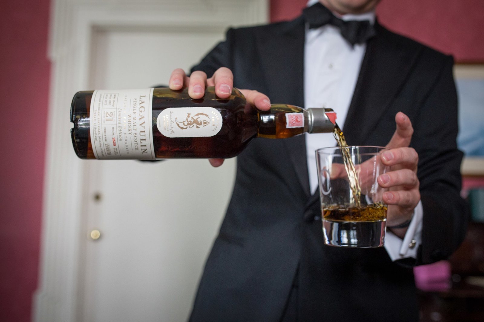 Groom getting ready at The Steamboat Inn for wedding at The Branford House in Groton, CT