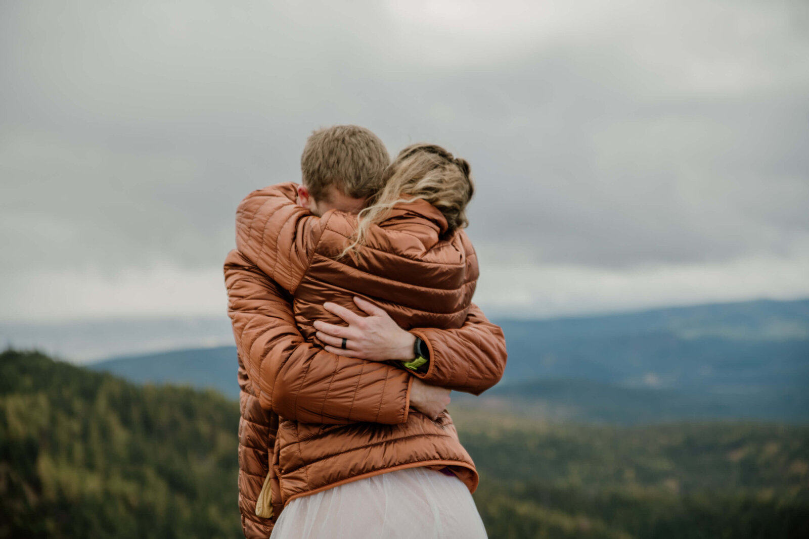 Bride and Groom hugging.