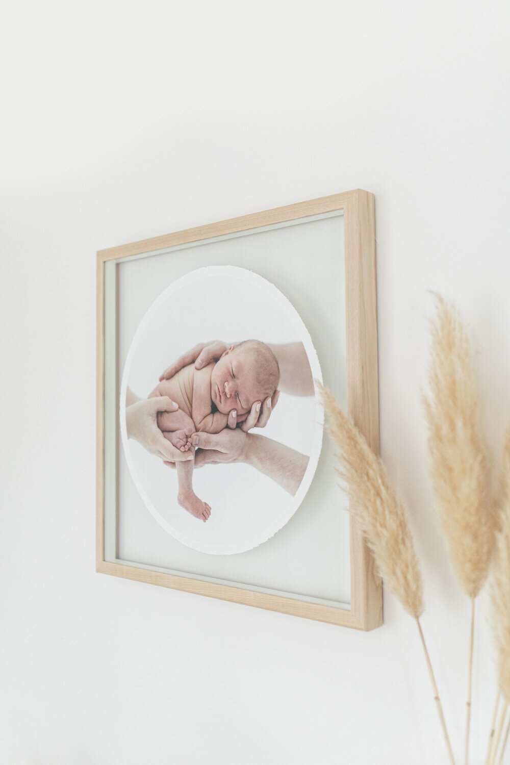 baby in picture frame