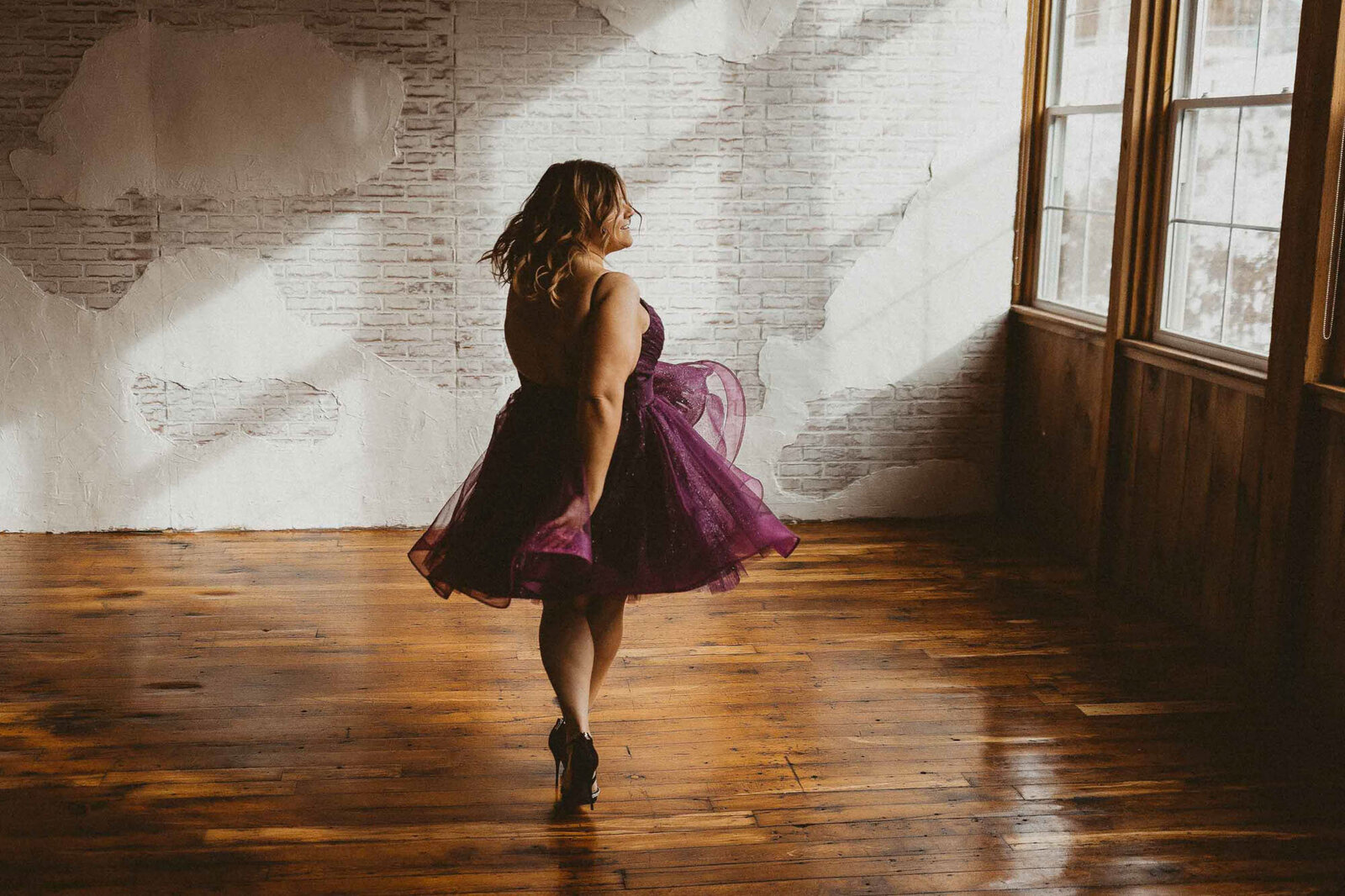 woman wearing a purple dress