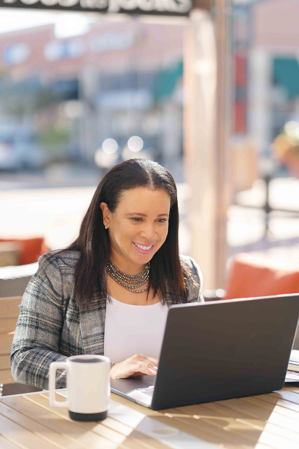 woman working on laptop during Gainesville,VA branding session