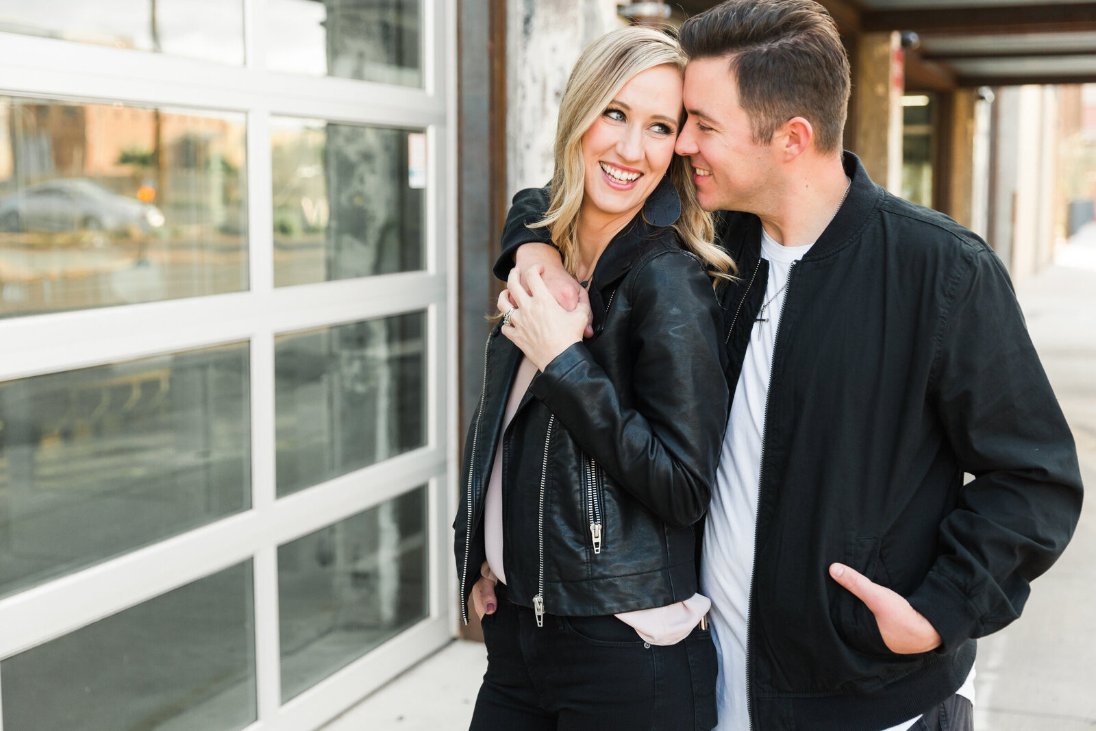 married couple smiling together in downtown Phoenix