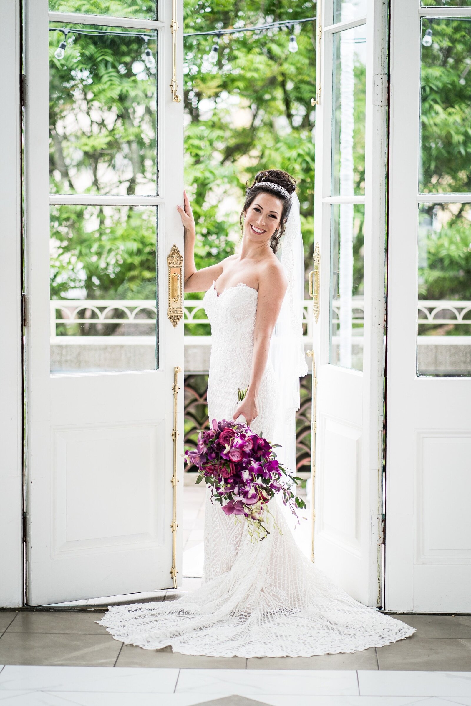 Bride standing in doorway at Marché wedding venue in New Orleans