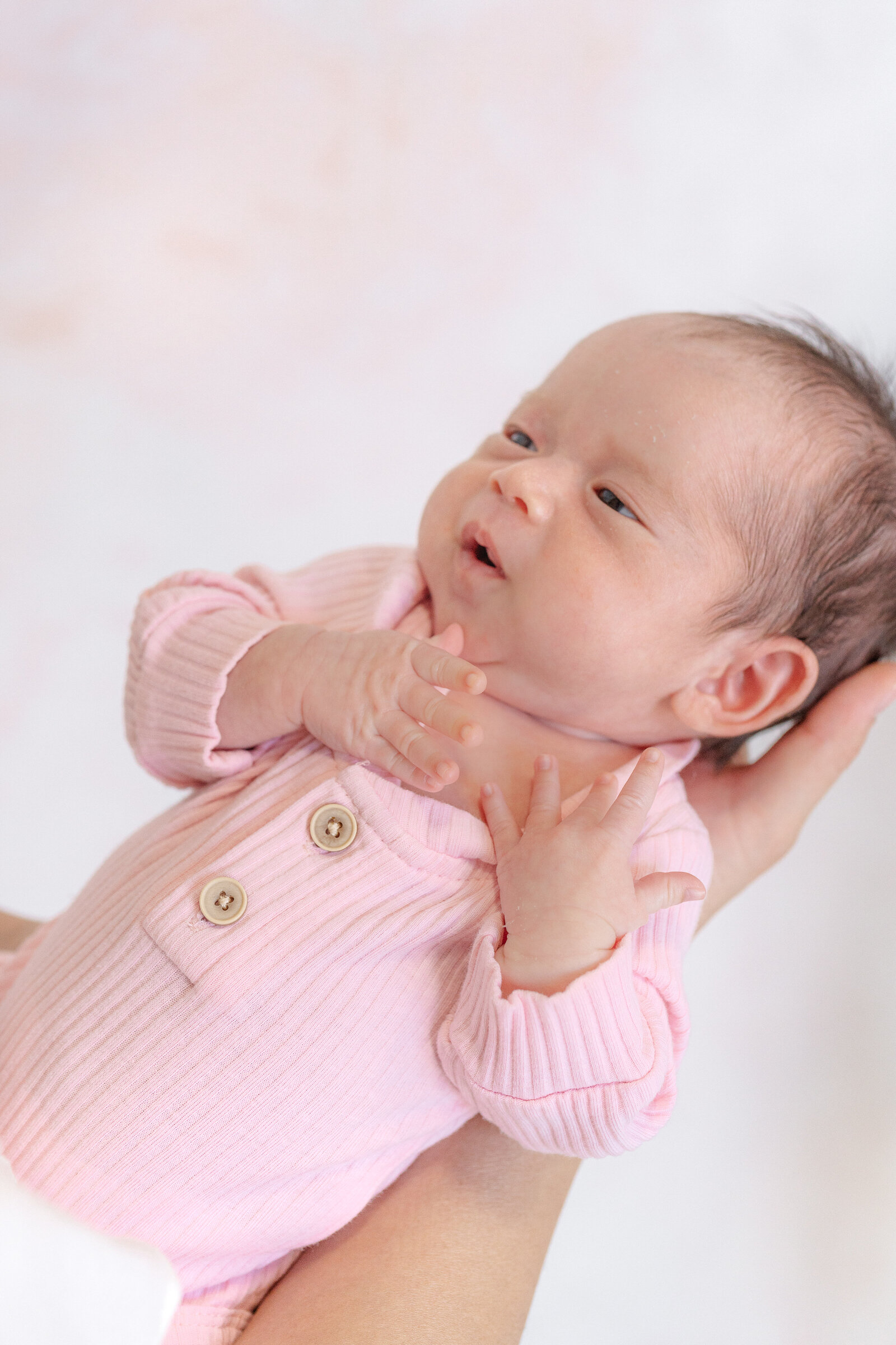 newborn baby girl in-home photoshoot