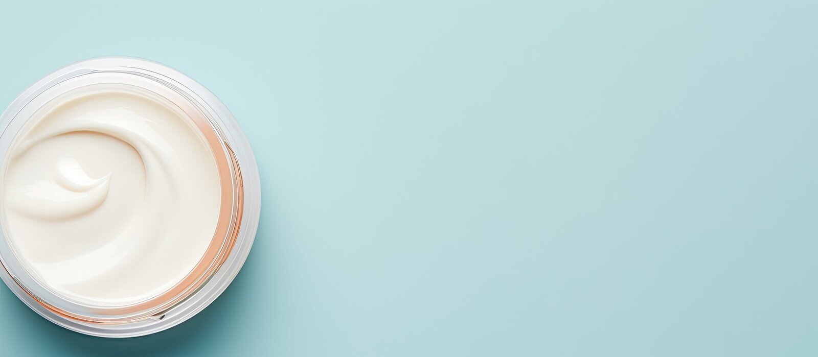 large-vecteezy_photo-of-a-jar-of-cream-on-a-vibrant-blue-background-with_26858684_large